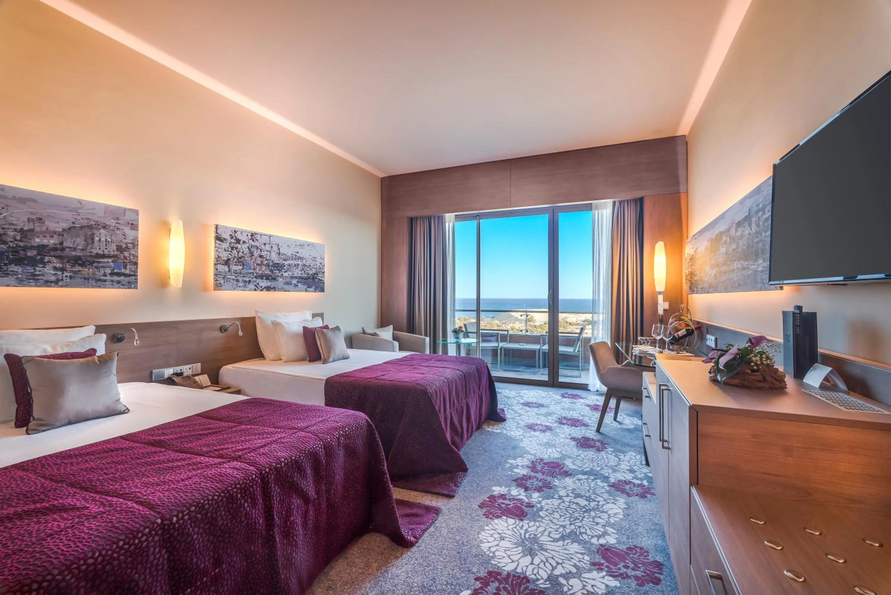 Communal lounge/ TV room, Bed in Concorde Luxury Resort & Casino