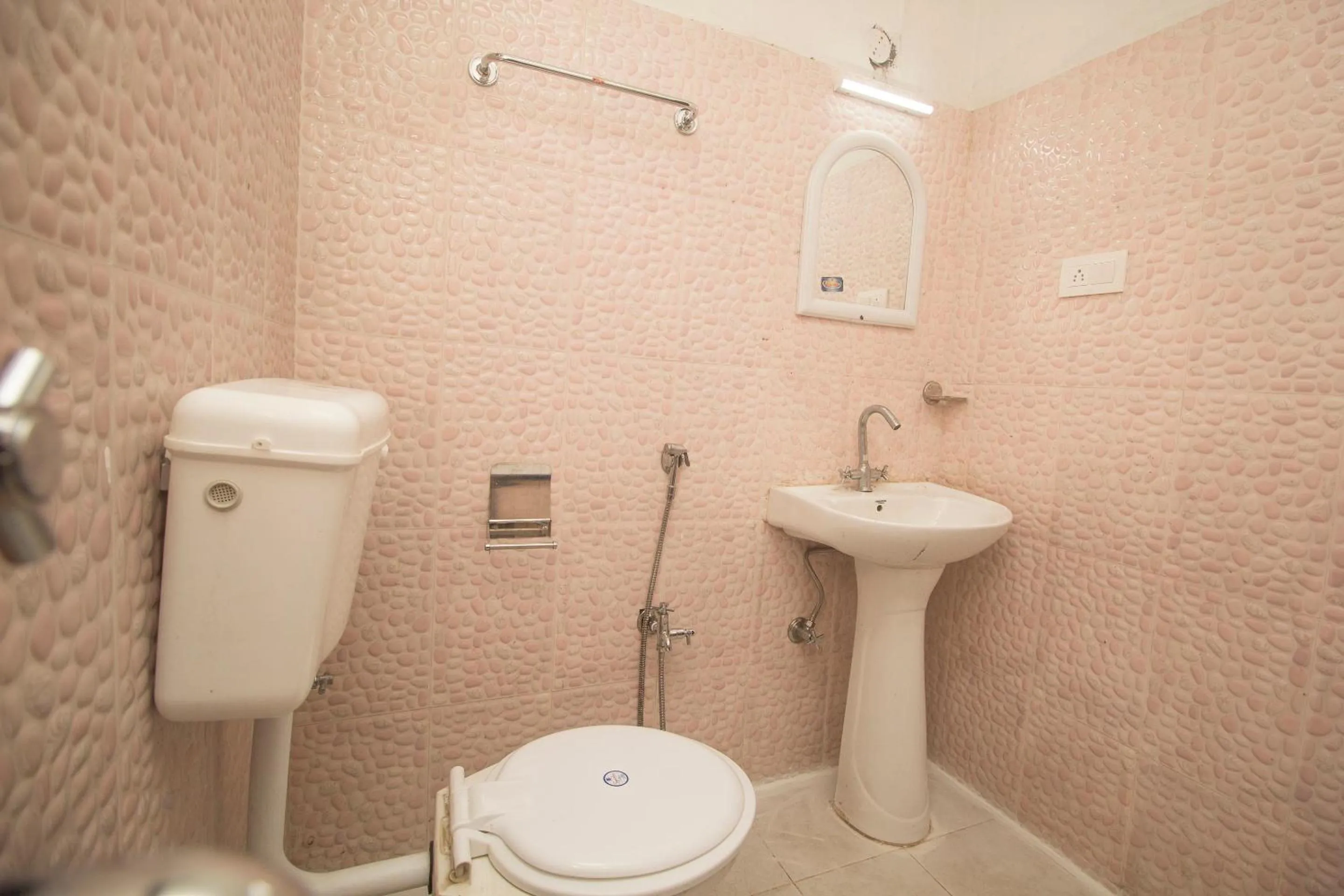 Bathroom in Hotel O Basar International