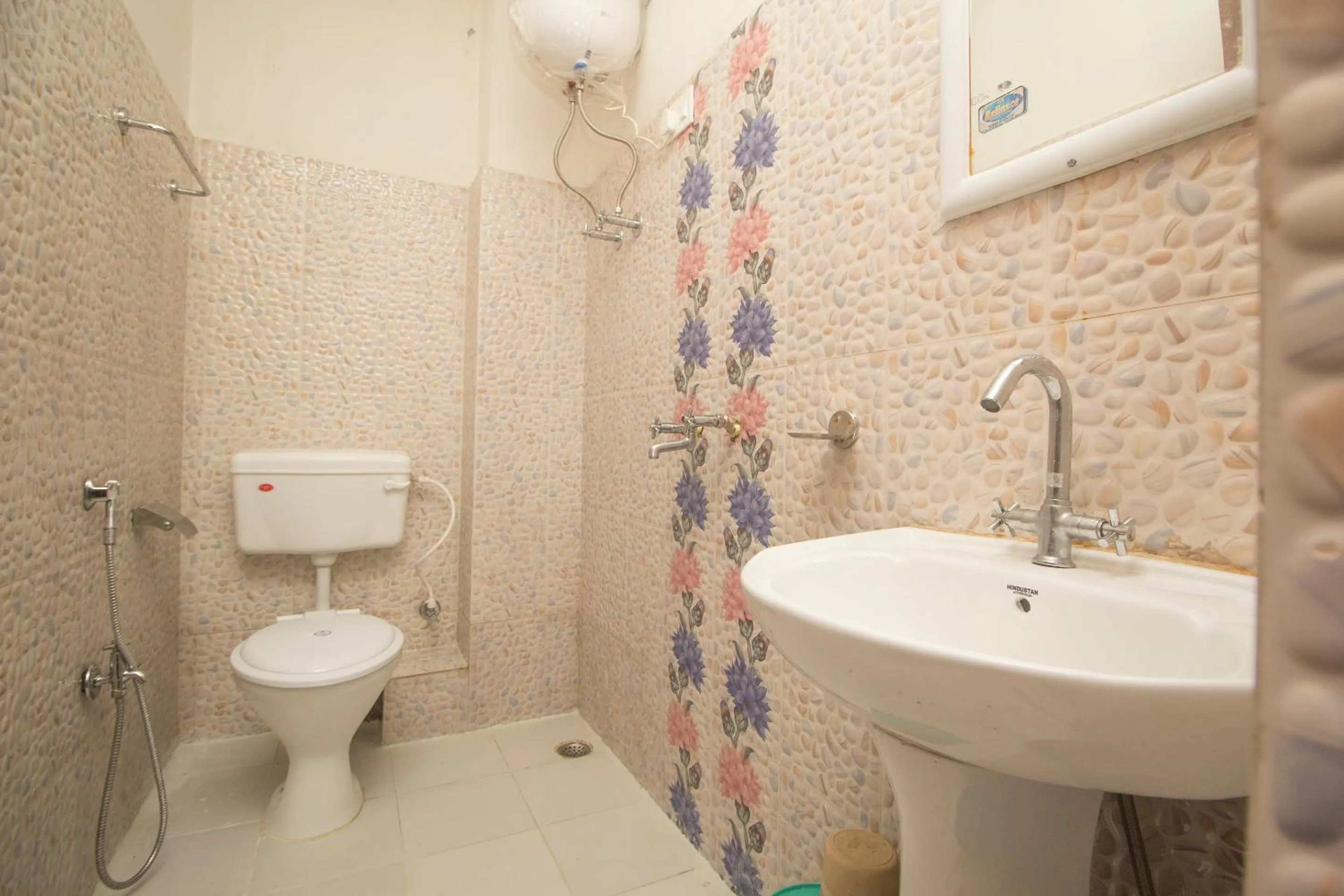 Bathroom in Hotel O Basar International