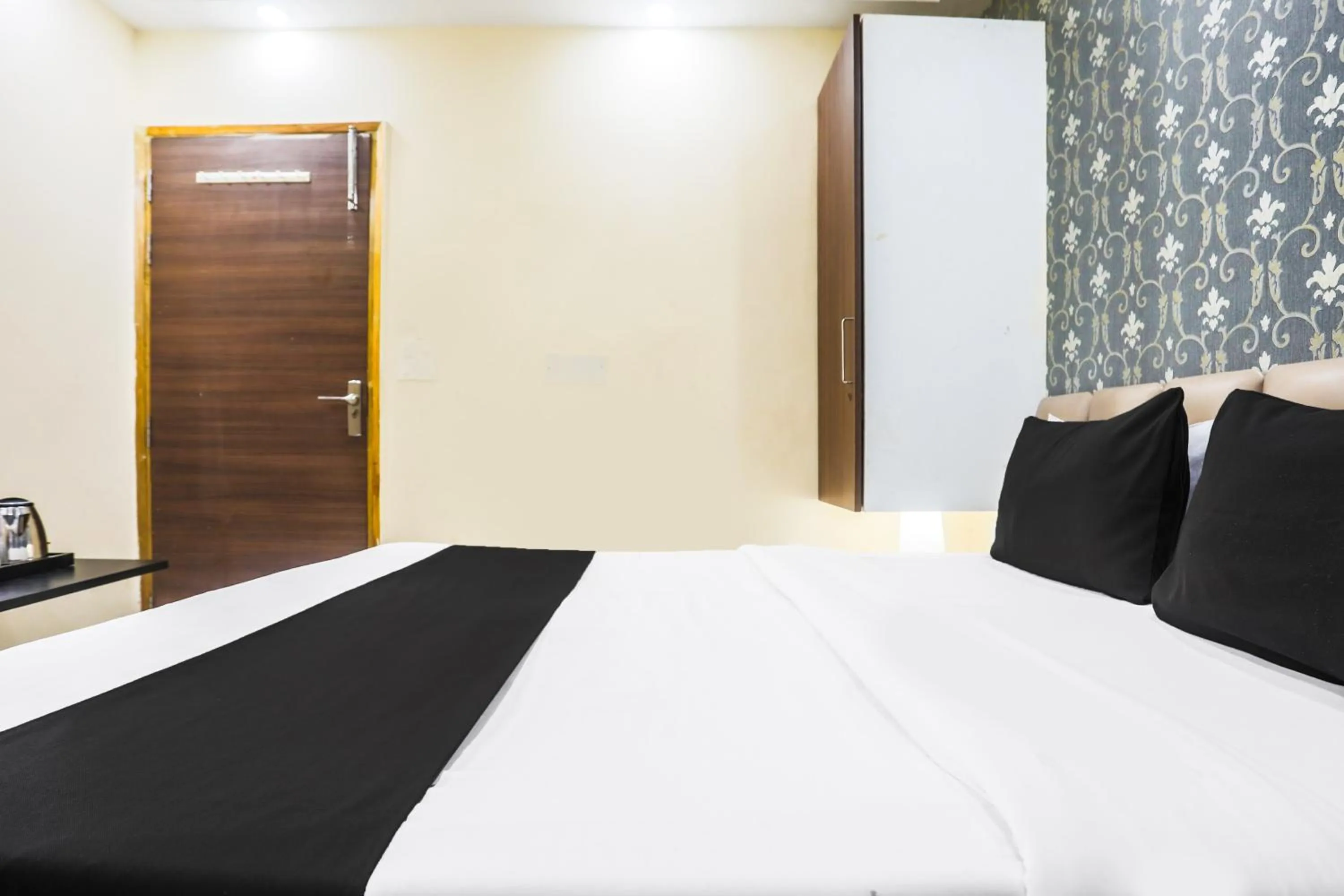 Bedroom in Super Collection O Sector 44 Near Botanical Garden formerly Hotel Culture