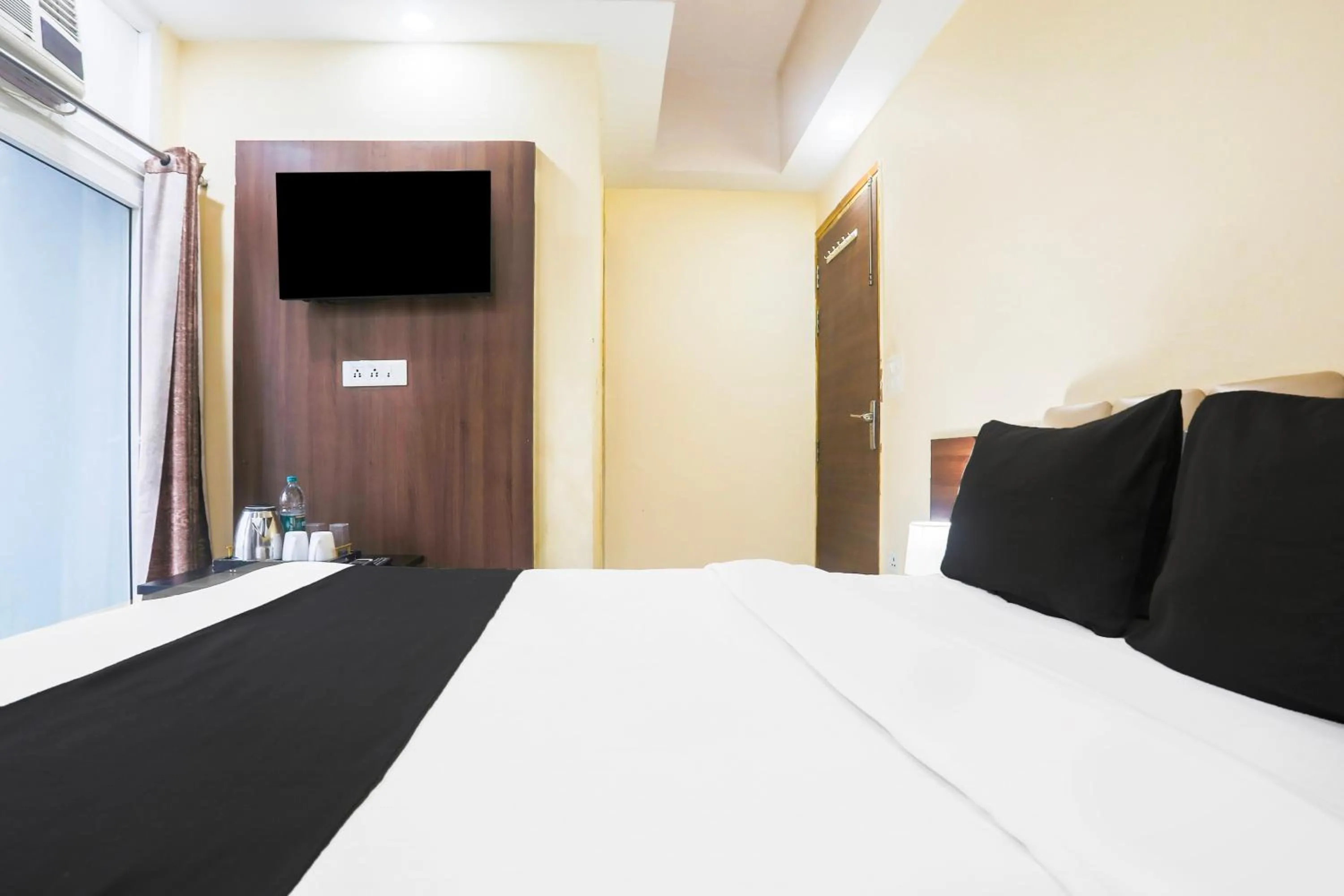 Bedroom in Super Collection O Sector 44 Near Botanical Garden formerly Hotel Culture