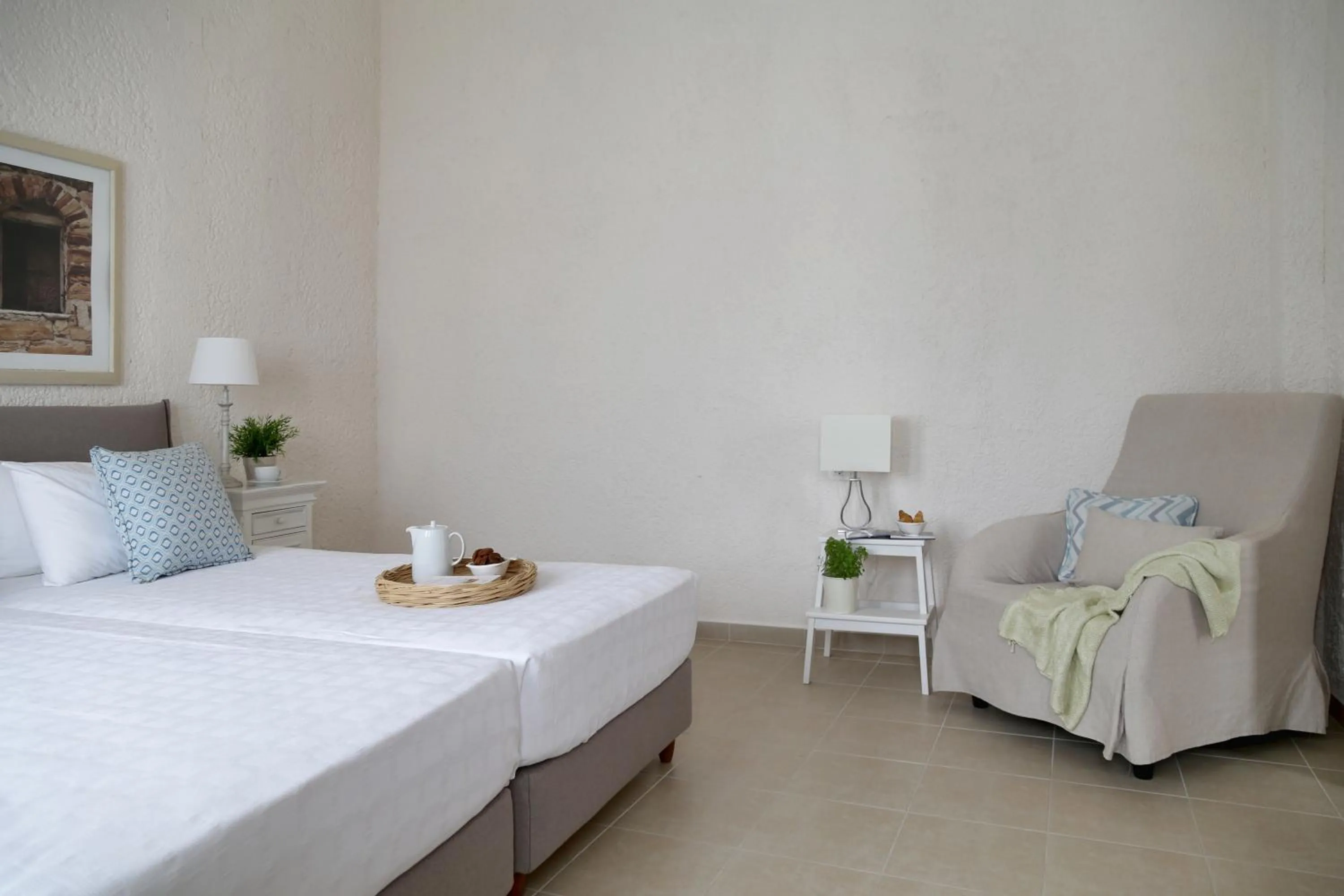 Bed in Skopelos Village Hotel