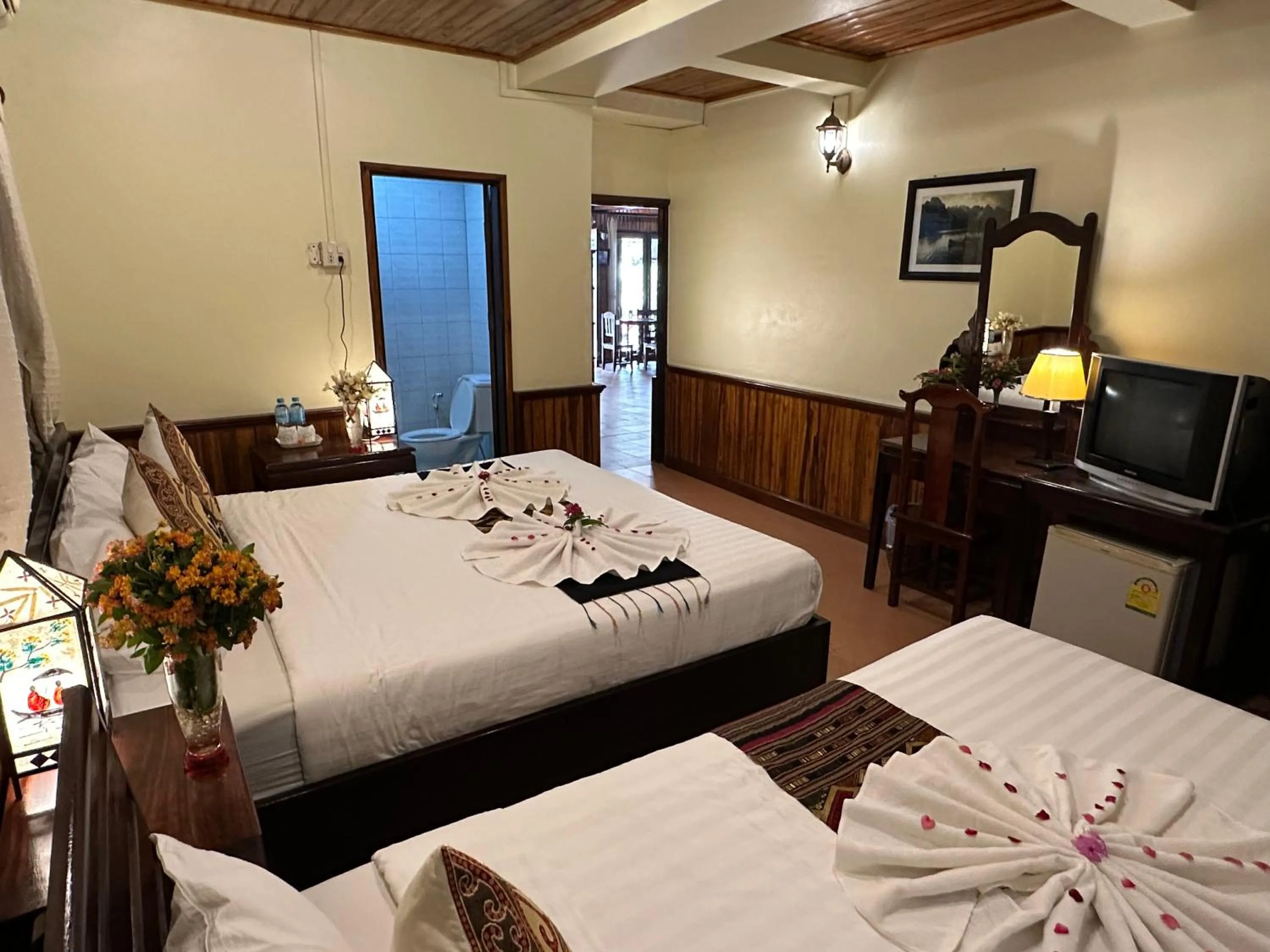 Communal lounge/ TV room, Bed in Villa Alounsavath Mekong Riverside