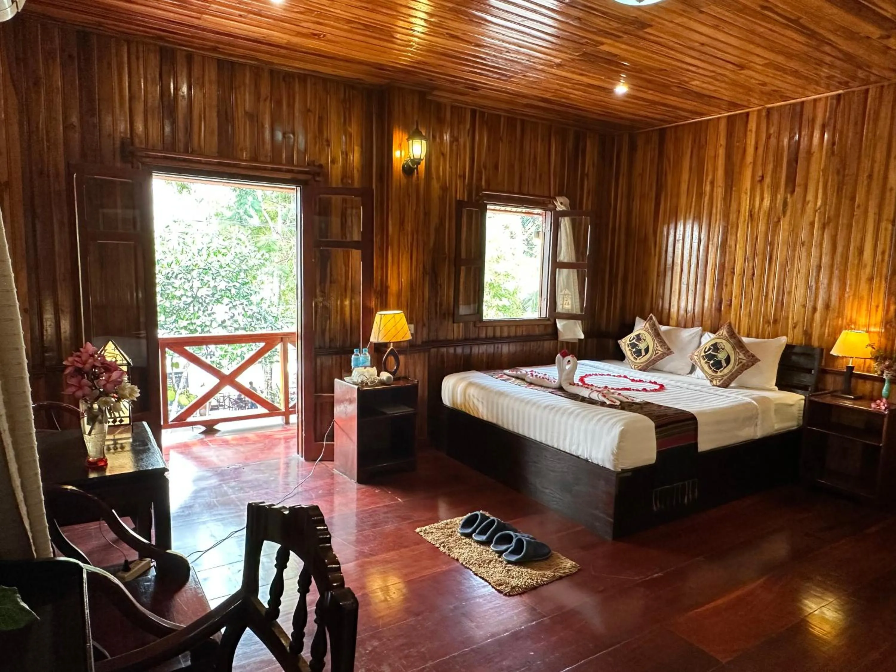 Bed in Villa Alounsavath Mekong Riverside