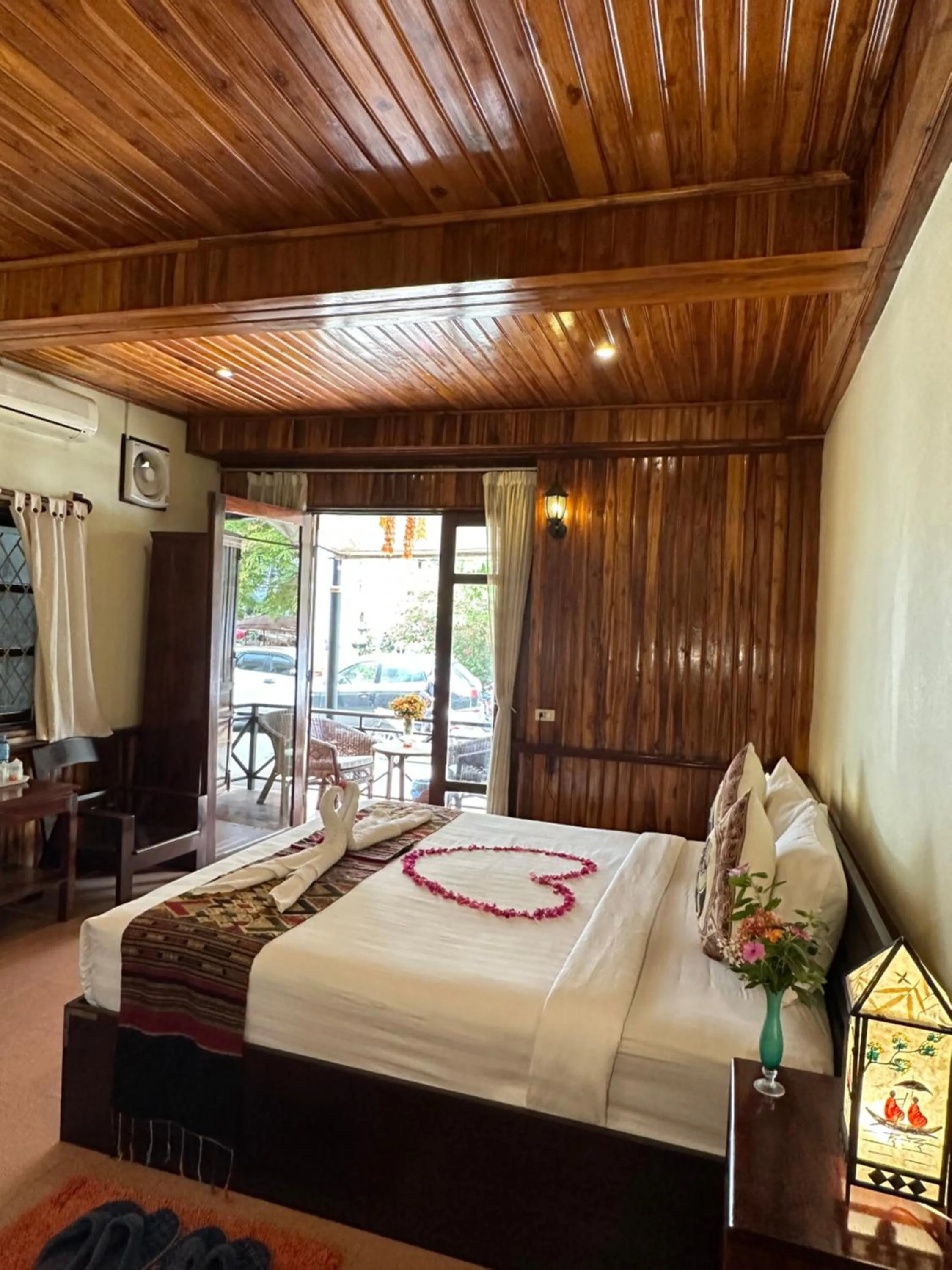 Bed in Villa Alounsavath Mekong Riverside