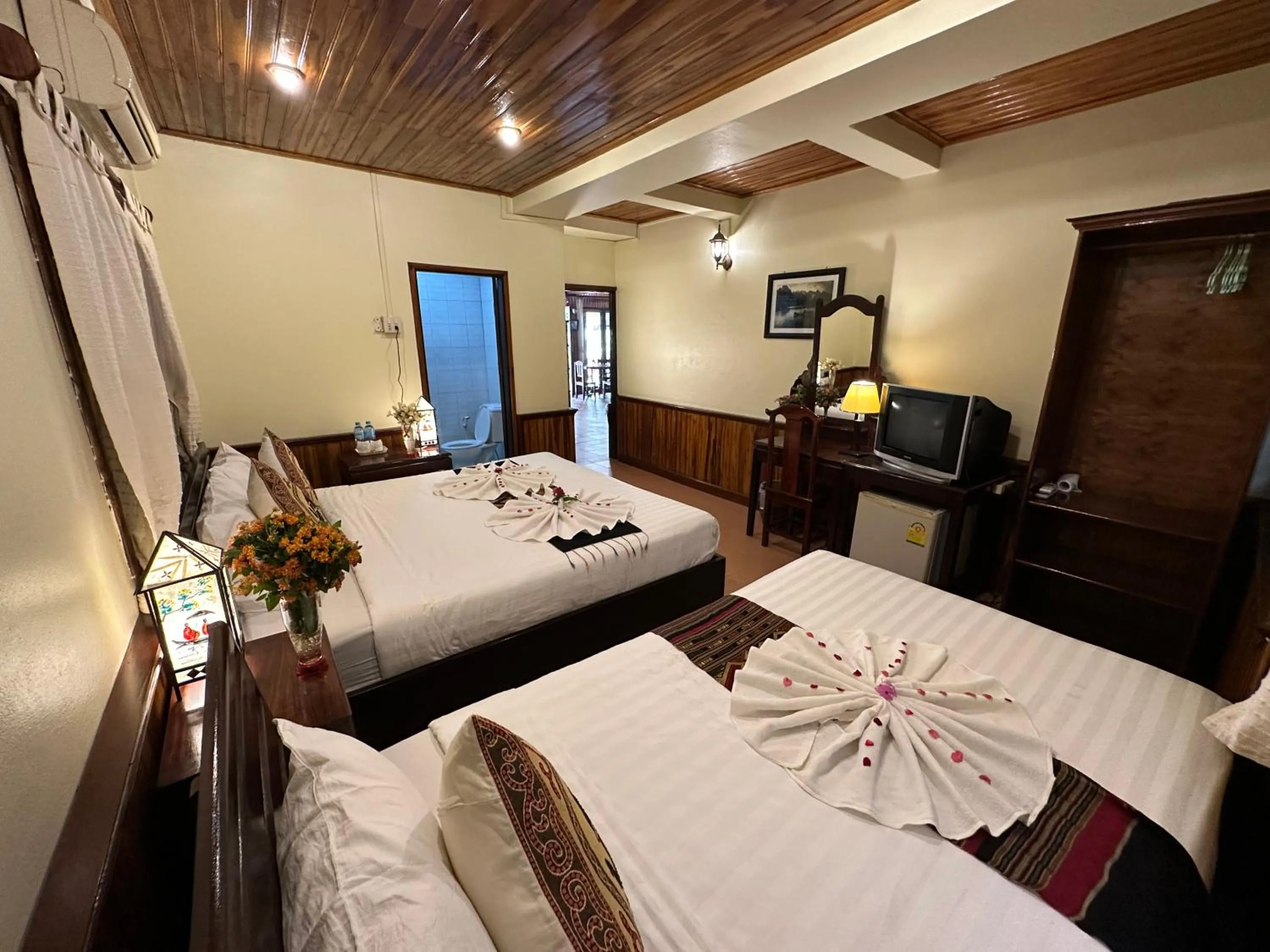 Bed in Villa Alounsavath Mekong Riverside