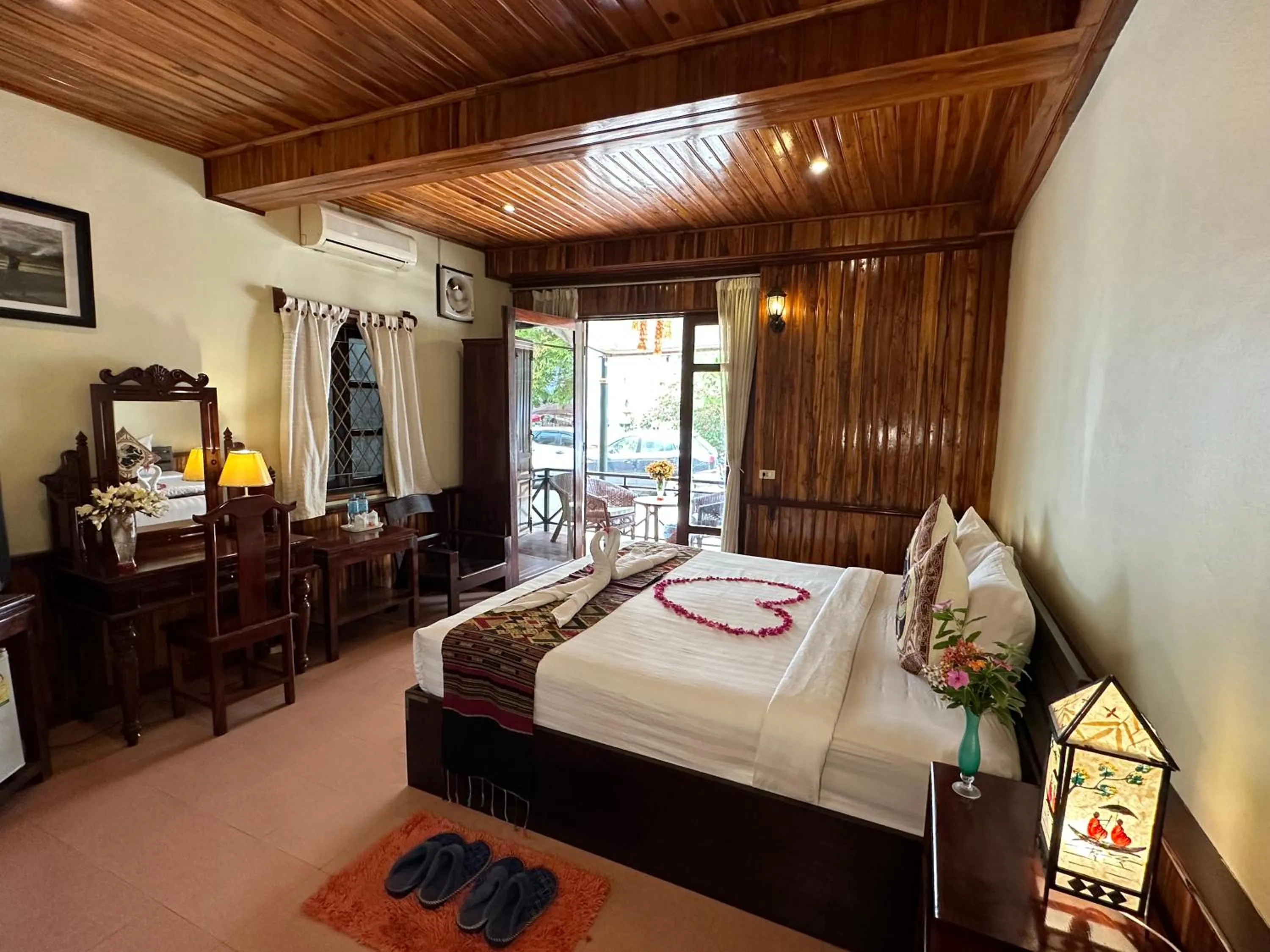 Bed in Villa Alounsavath Mekong Riverside
