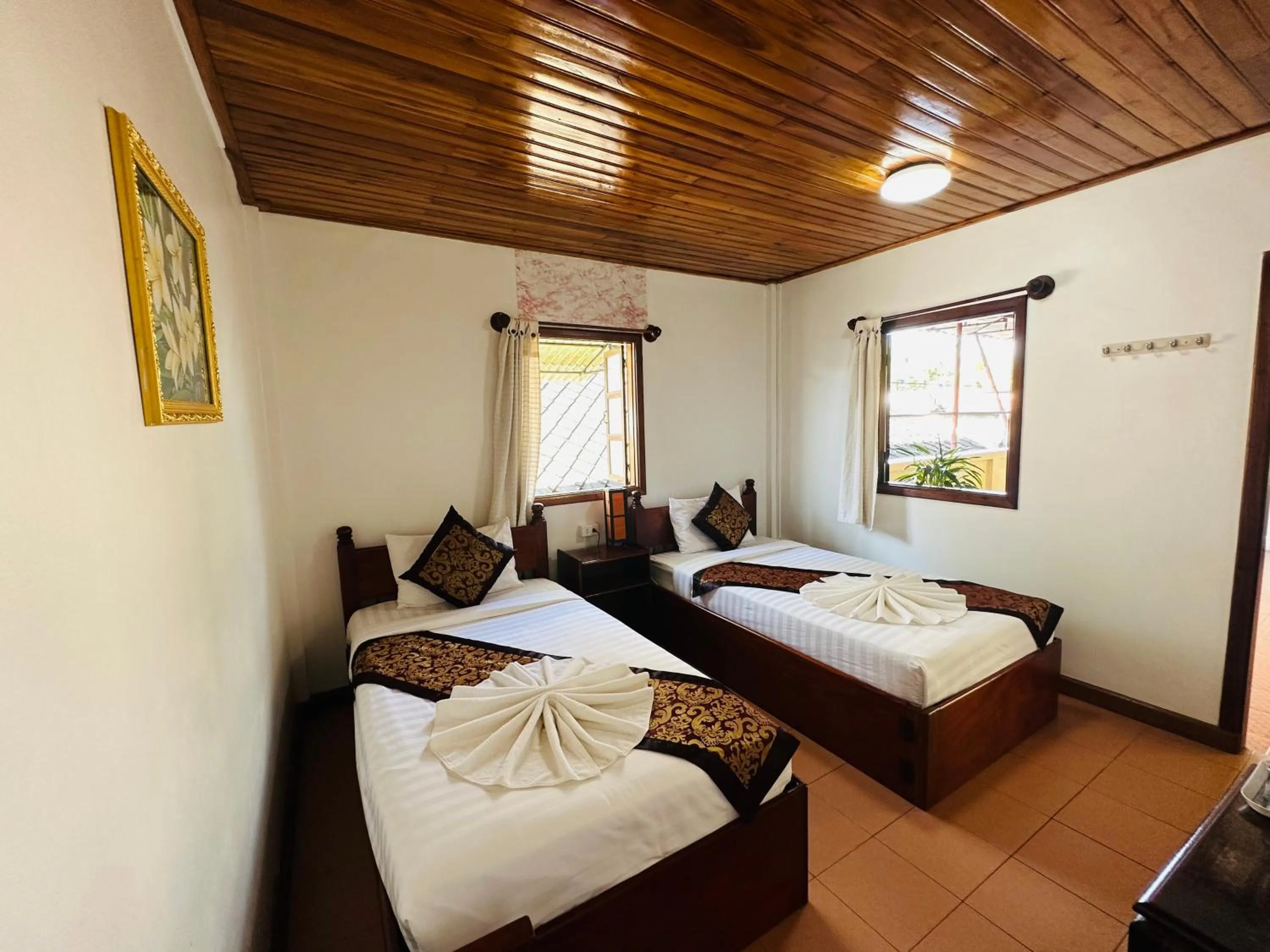 Bed in Villa Alounsavath Mekong Riverside