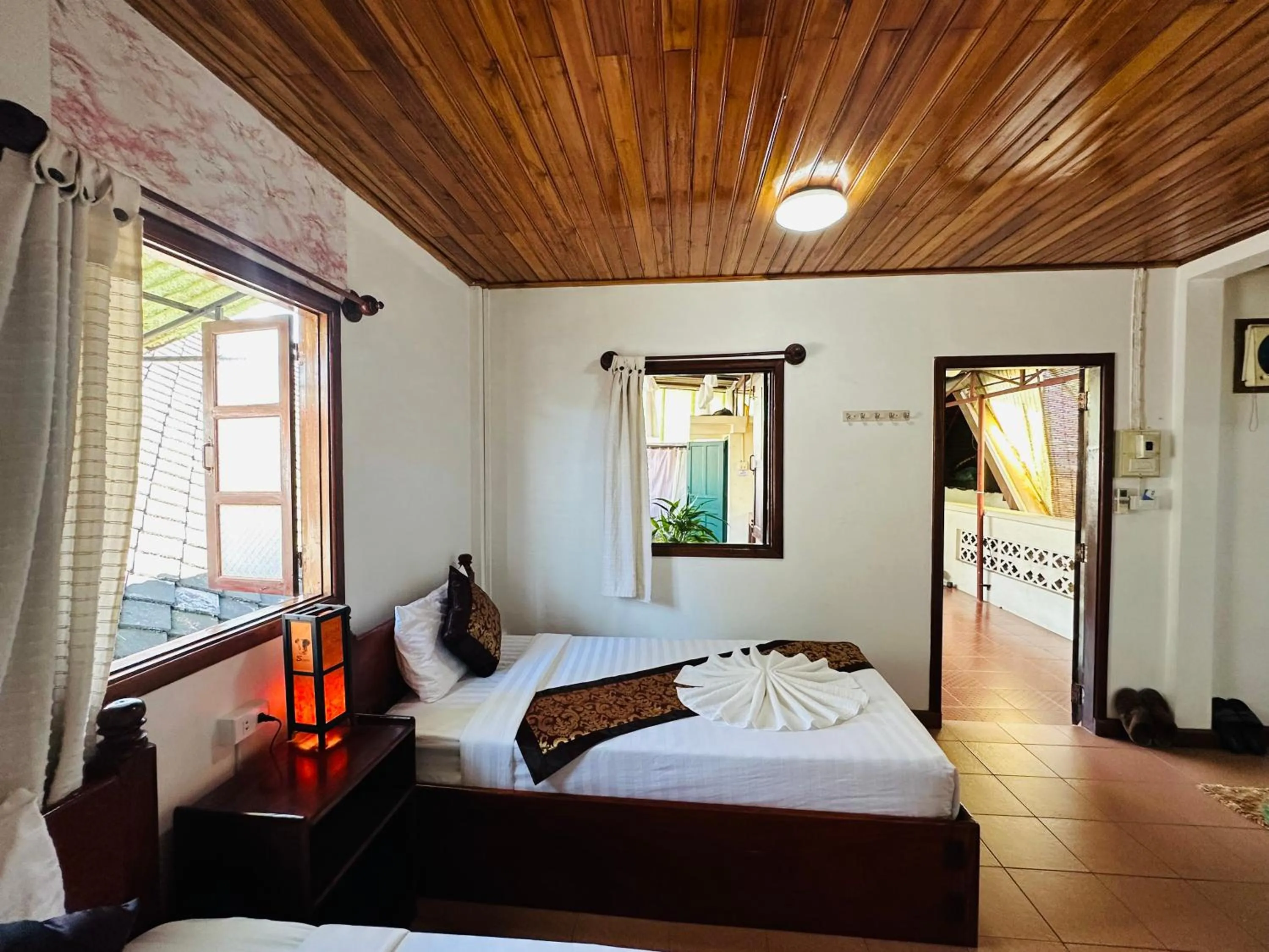 Bed in Villa Alounsavath Mekong Riverside