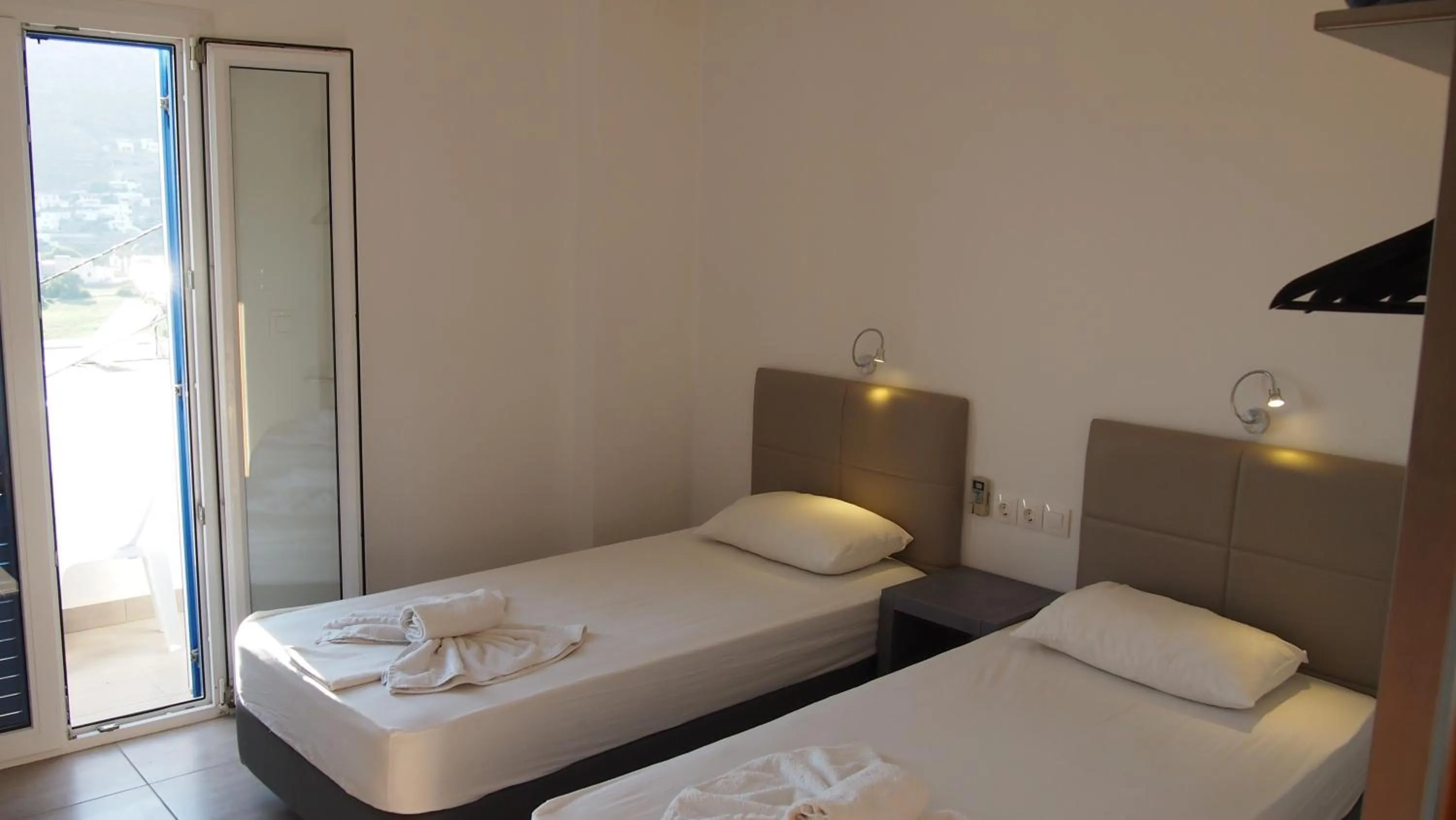 Bed in Homer's Inn Hotel