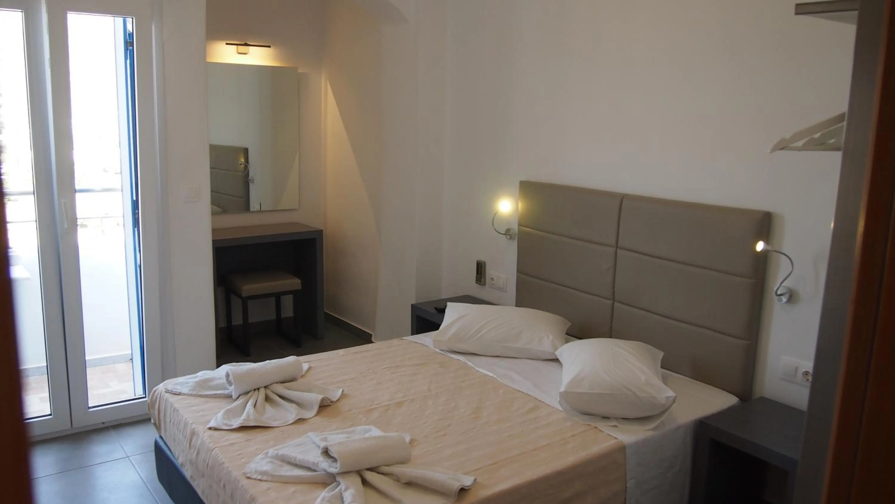 Bed in Homer's Inn Hotel