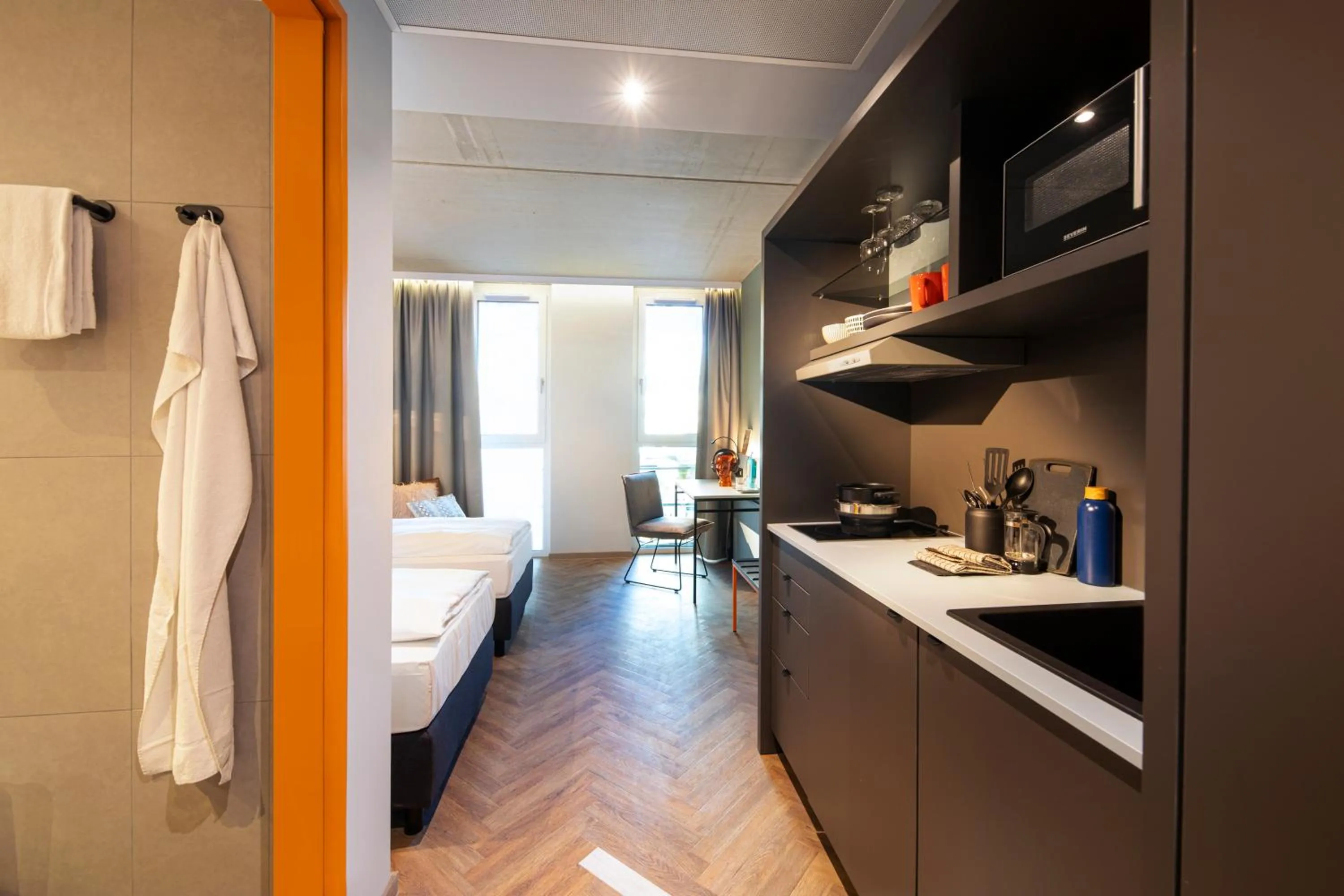 Photo of the whole room, Bed in LOGINN Hotel Waiblingen