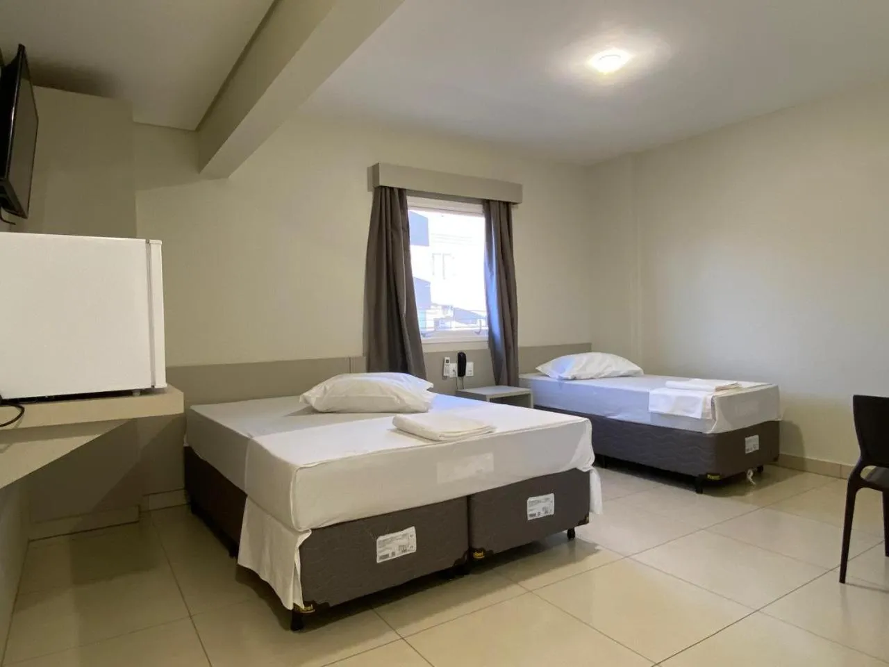 Photo of the whole room, Bed in San Martin Hotel