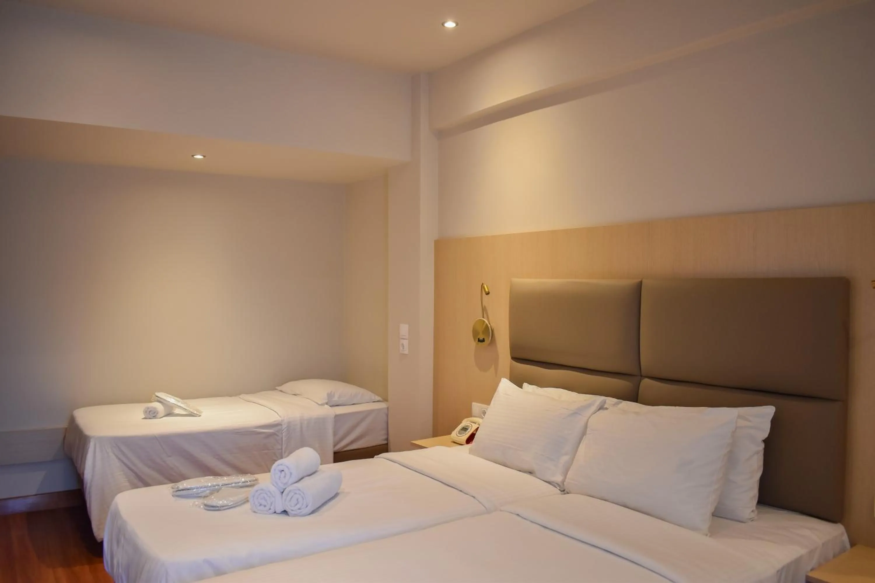 Bed in Anemoni Piraeus Hotel