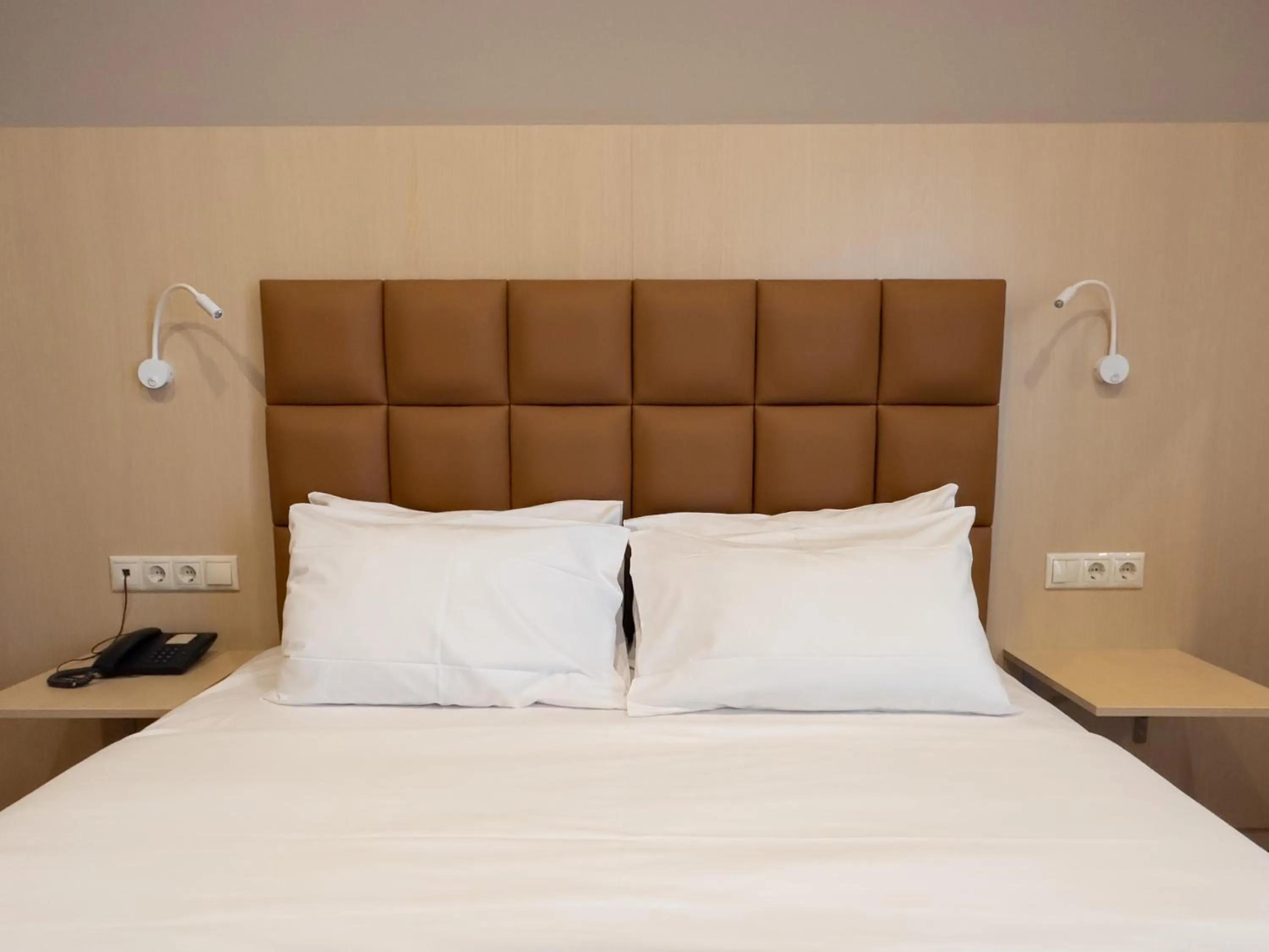 Bed in Anemoni Piraeus Hotel