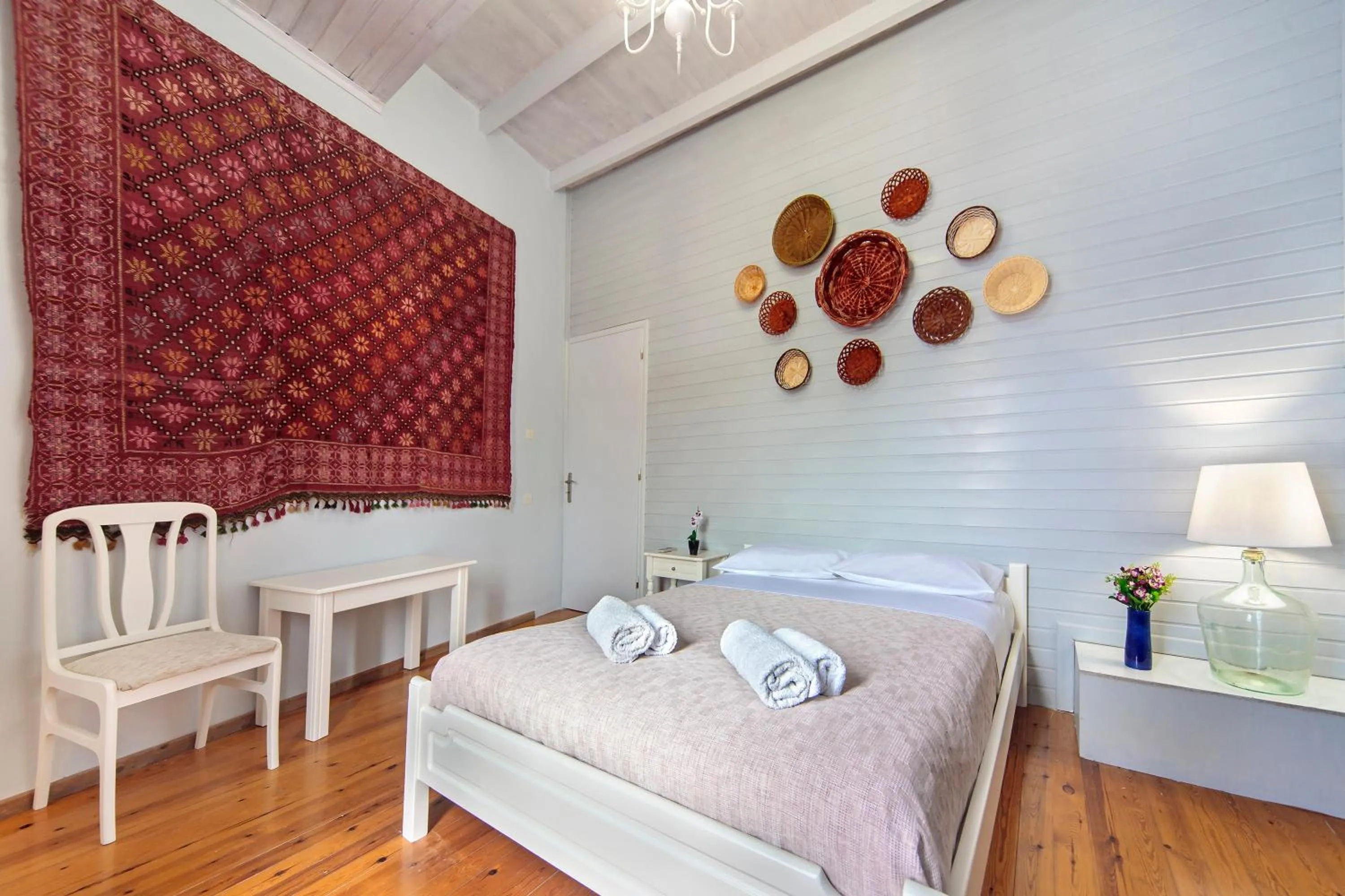 Bedroom in KasteliSuites