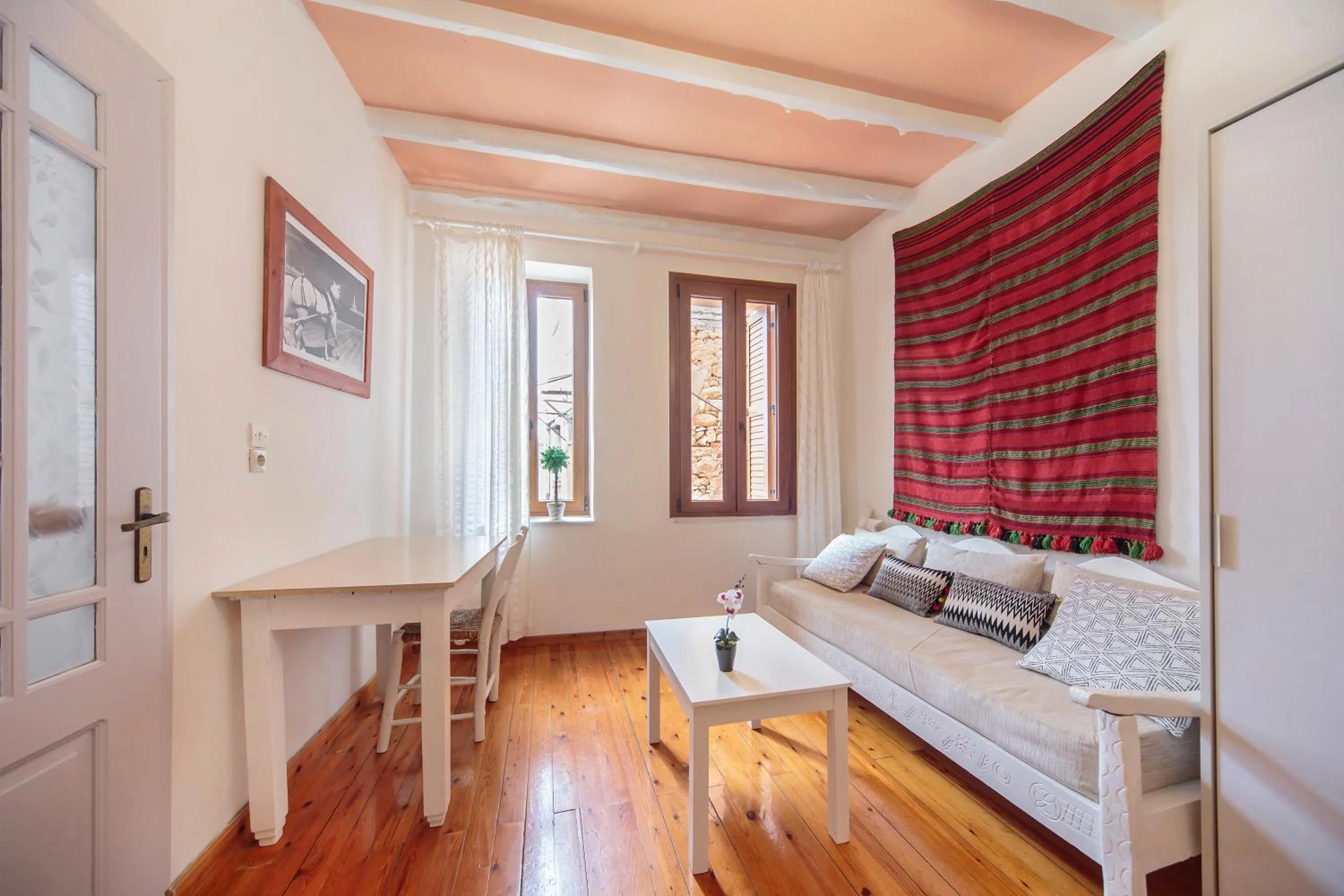 Seating area in KasteliSuites