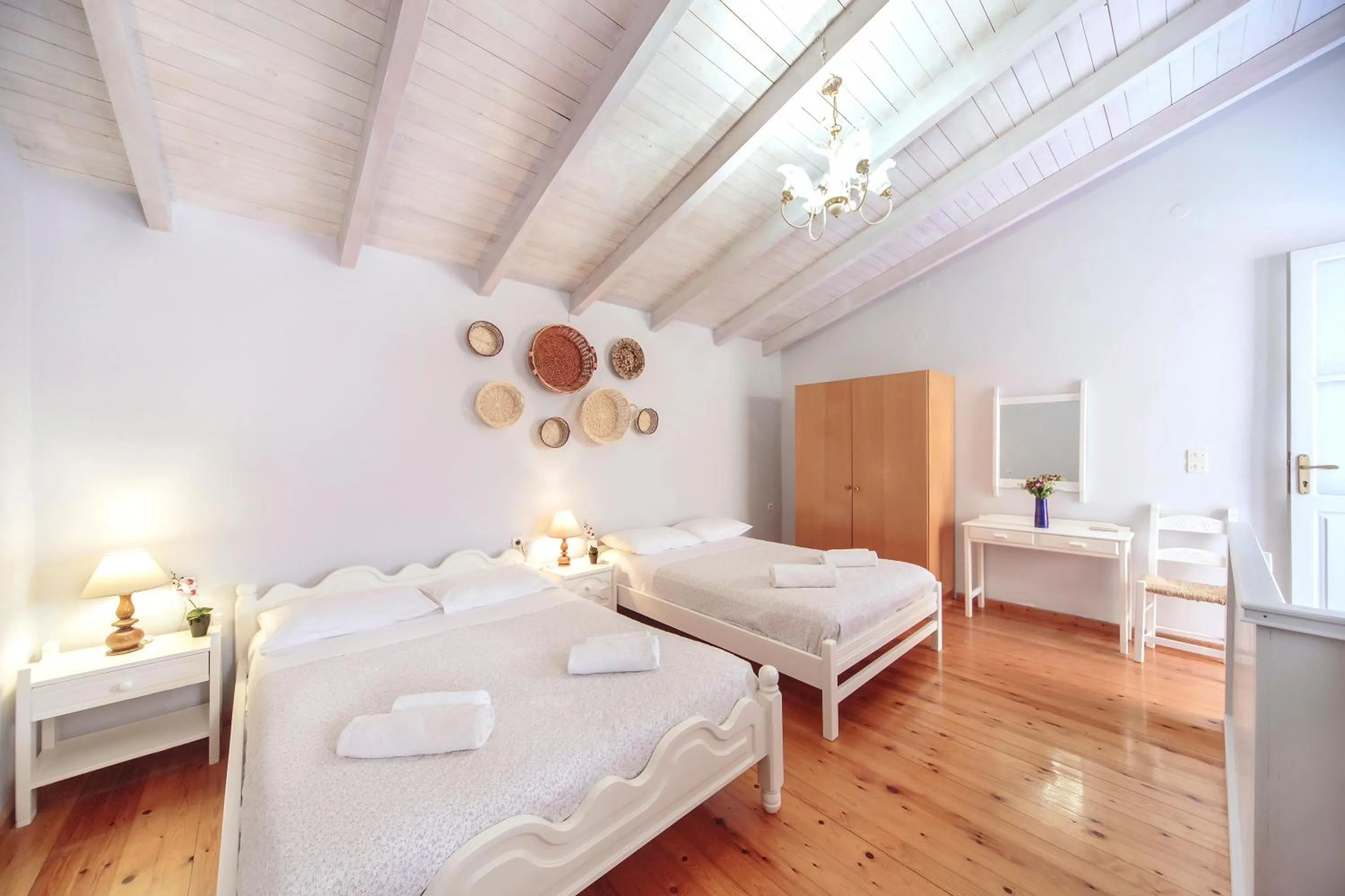 Bedroom in KasteliSuites