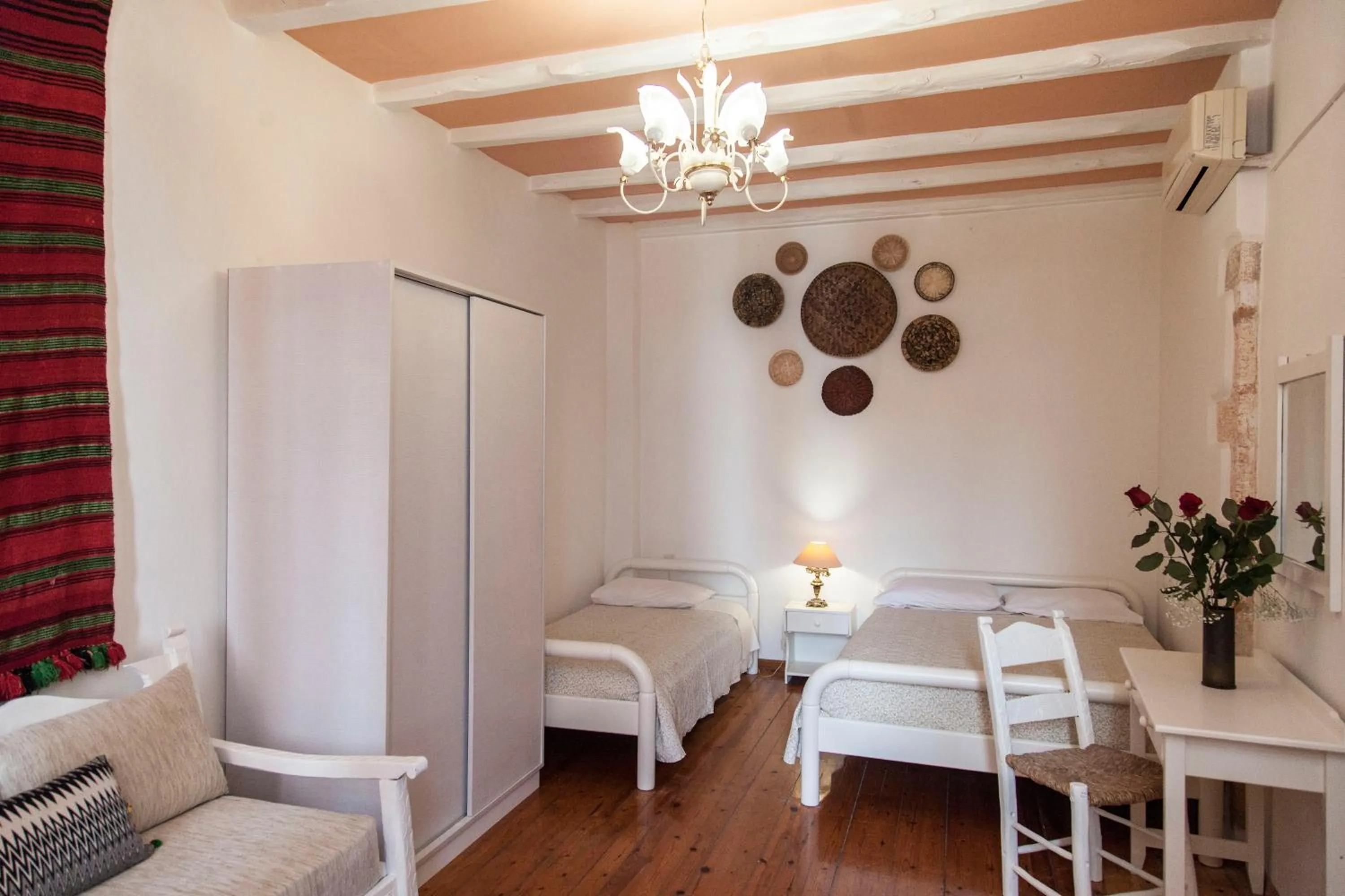 Bedroom in KasteliSuites