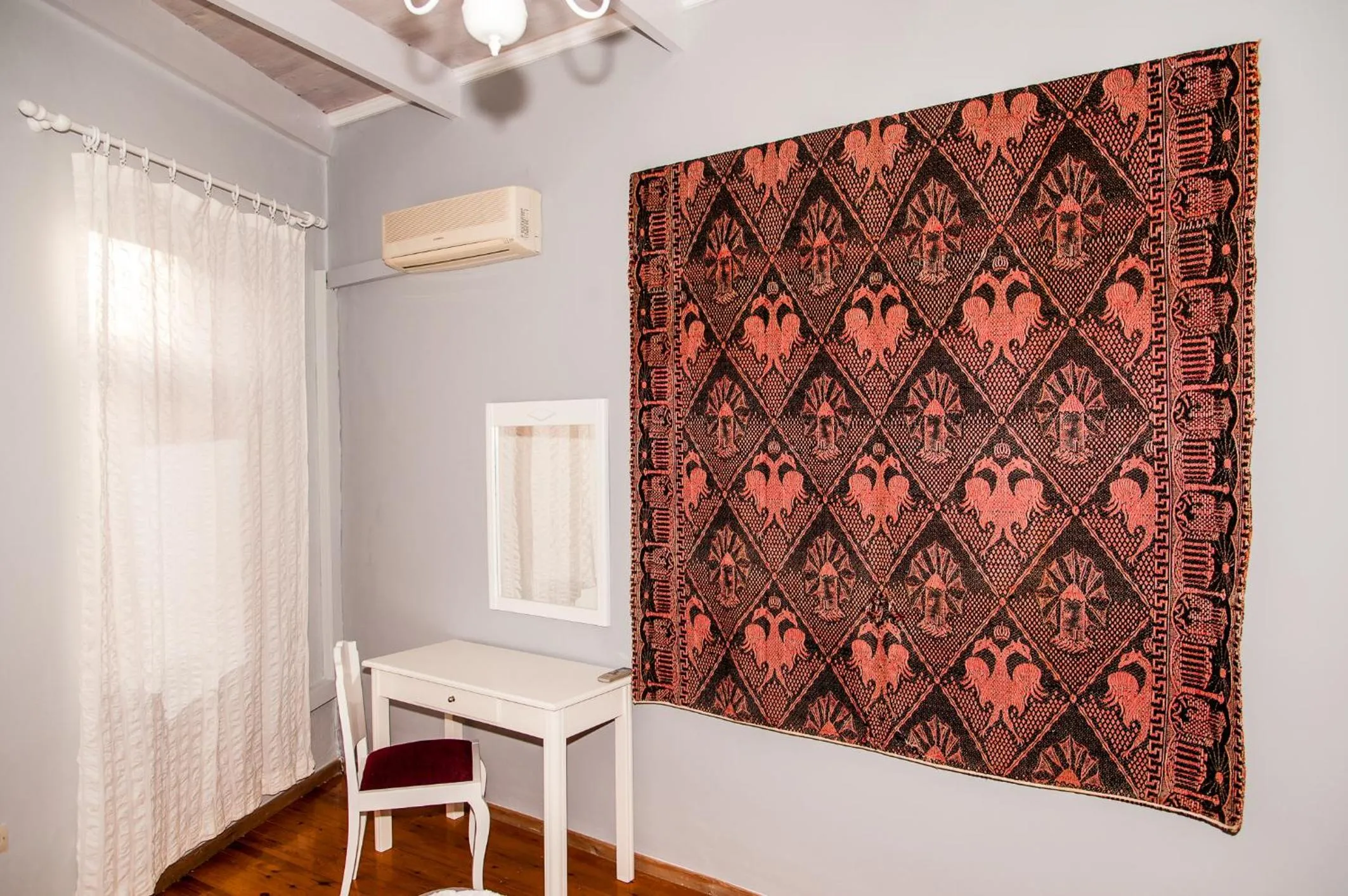 Bedroom in KasteliSuites