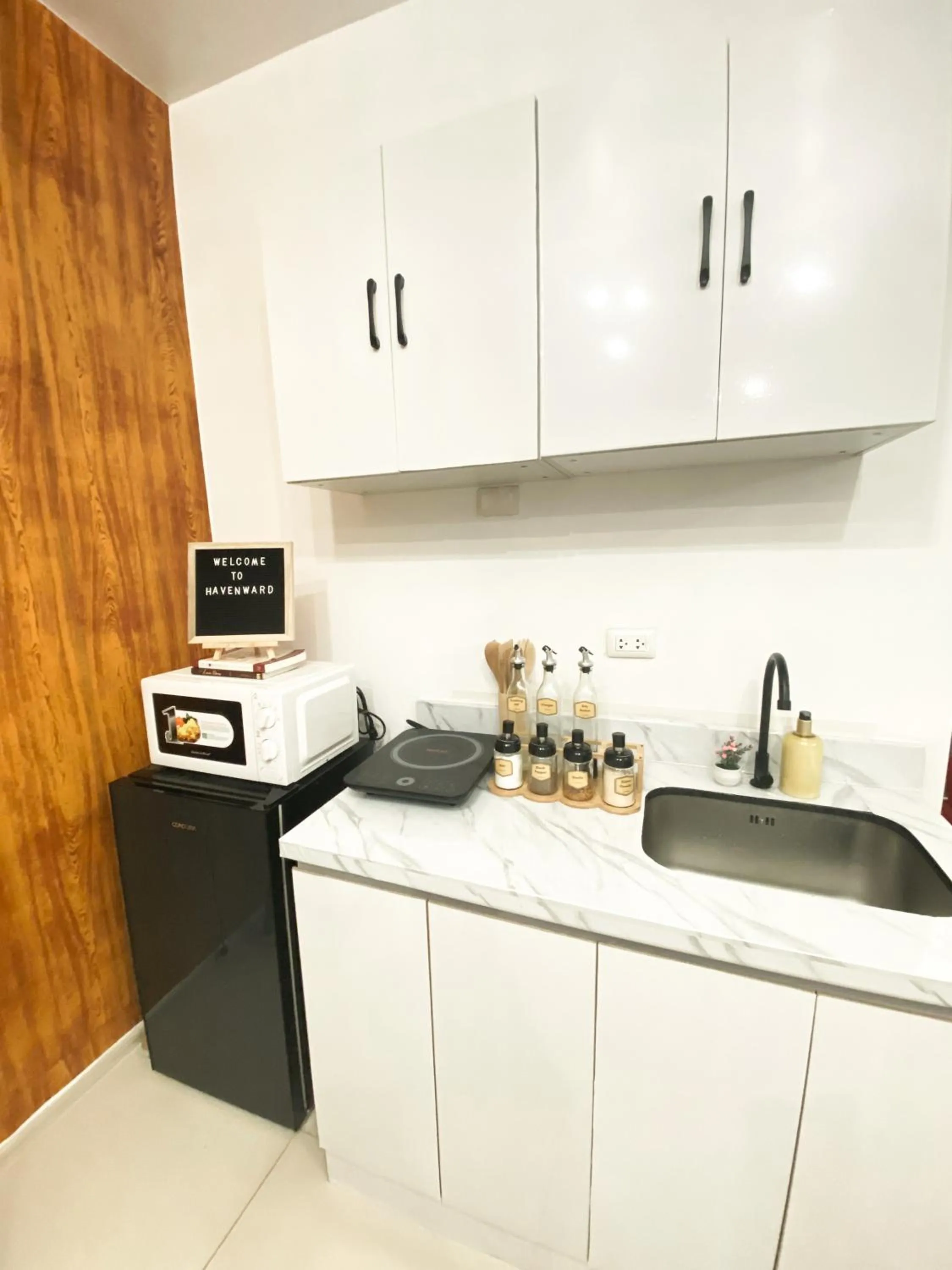 Kitchen or kitchenette in Fully furnished condo in Quezon City