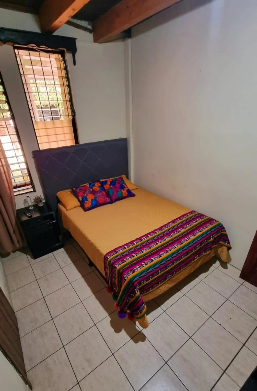 Photo of the whole room, Bed in AZURA HOTEL BOUTIQUE