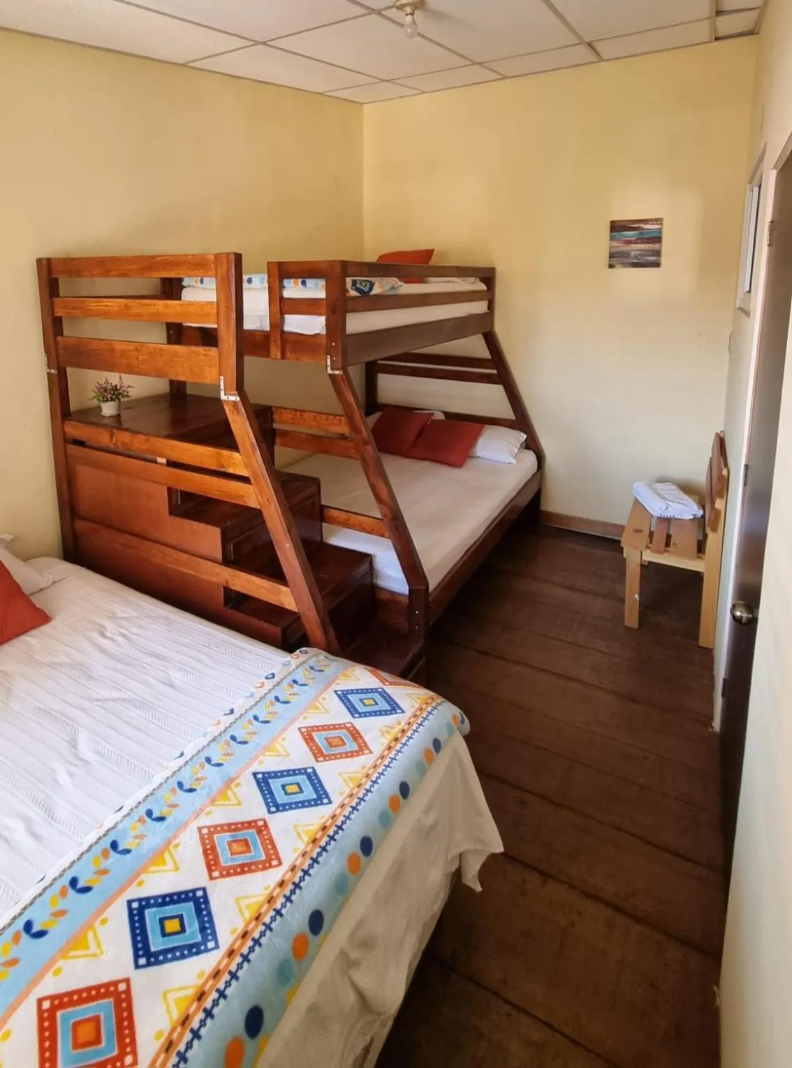 Bed in AZURA HOTEL BOUTIQUE