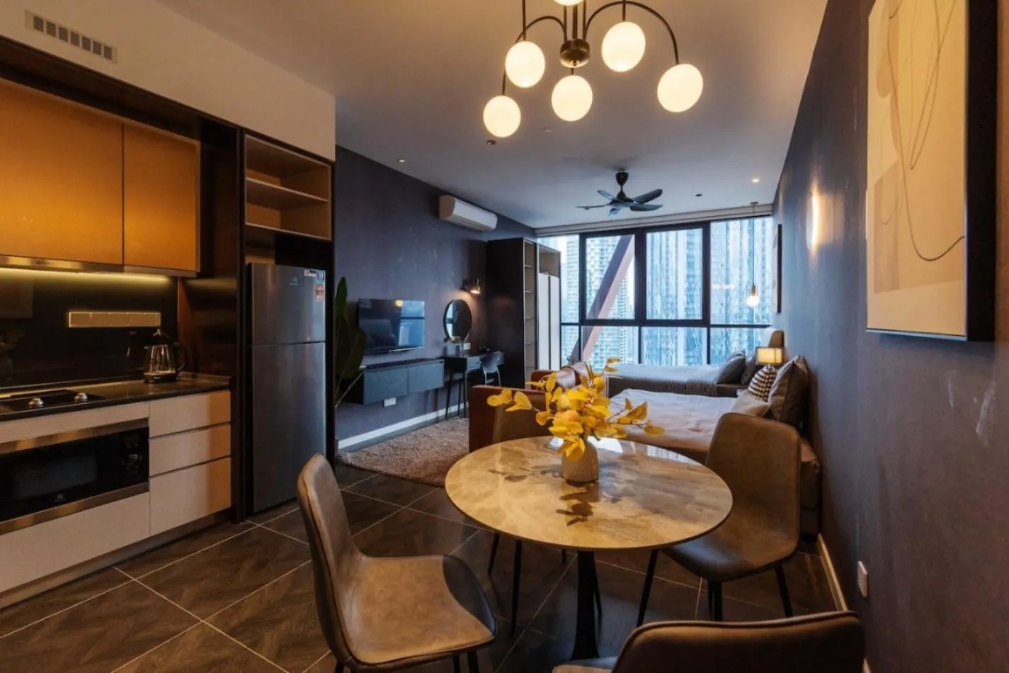 Living room in Scarletz Suites KLCC Twin Tower by Purple Orchid