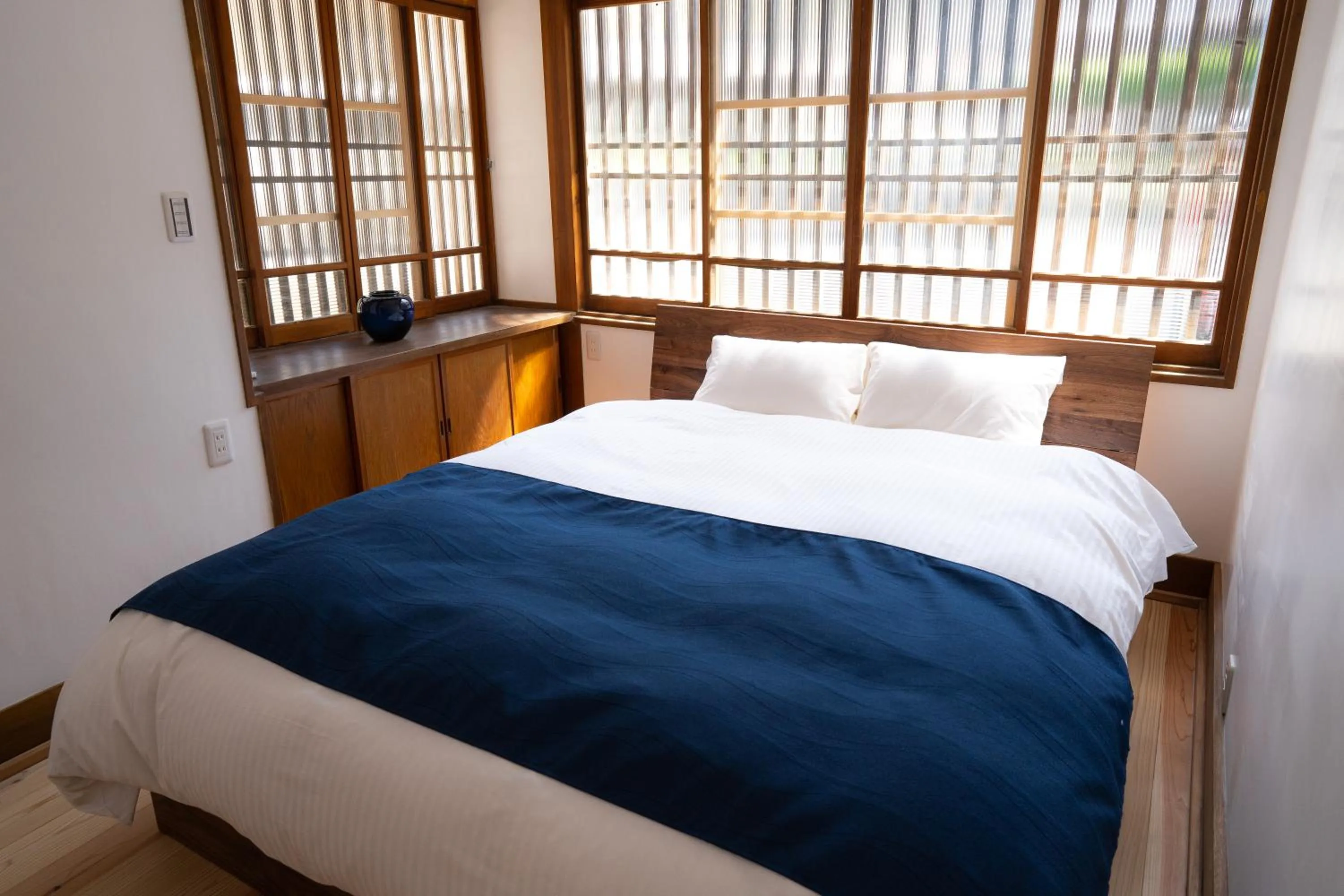 Bed in Satoyama Hotel Kanenone Tamba