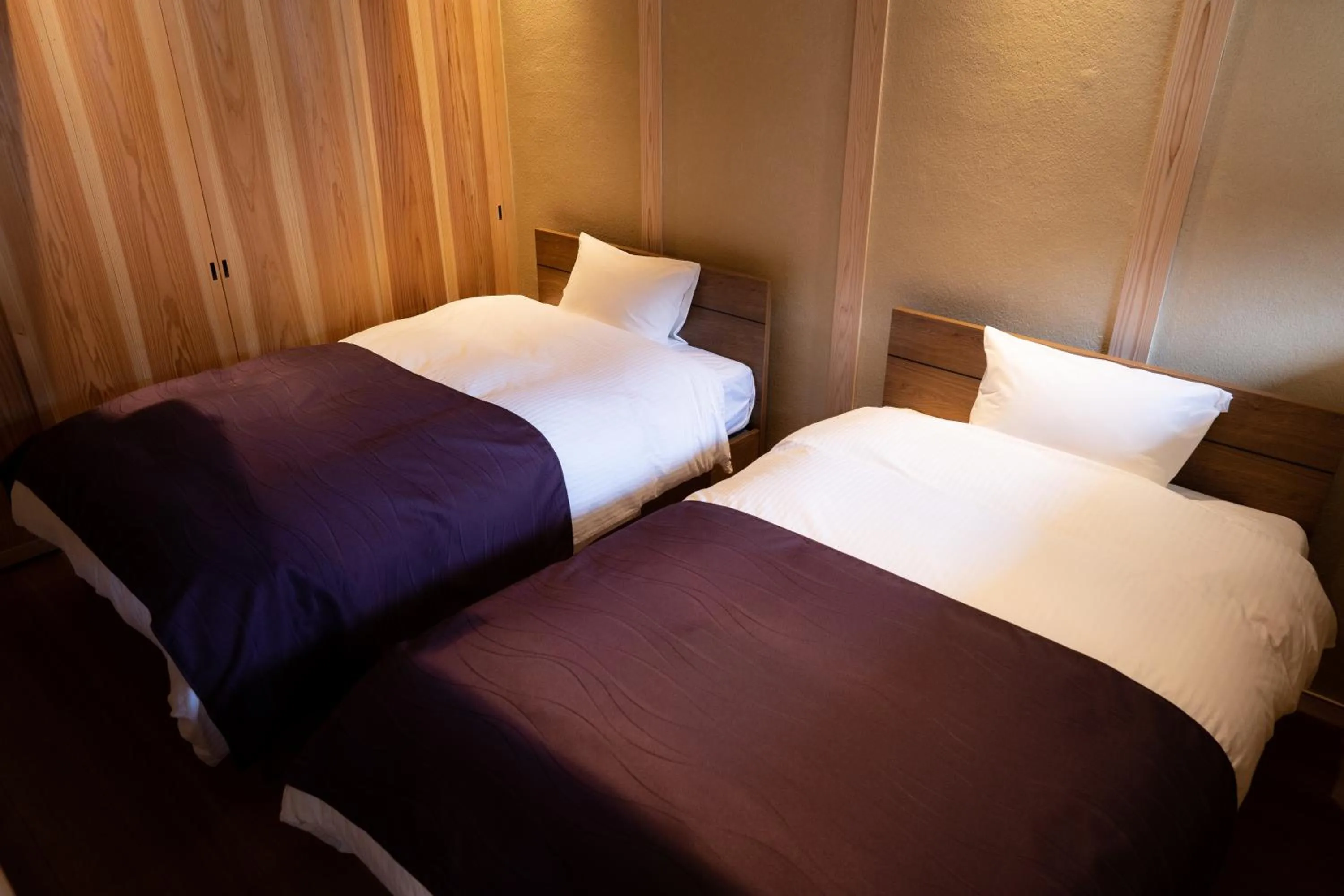 Bed in Satoyama Hotel Kanenone Tamba