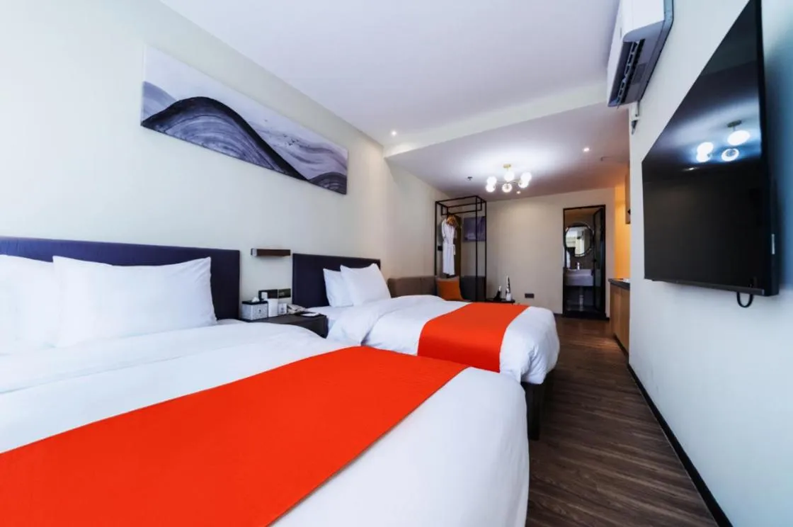 Bed in Shenzhen Kingkey Kingyu Hotel