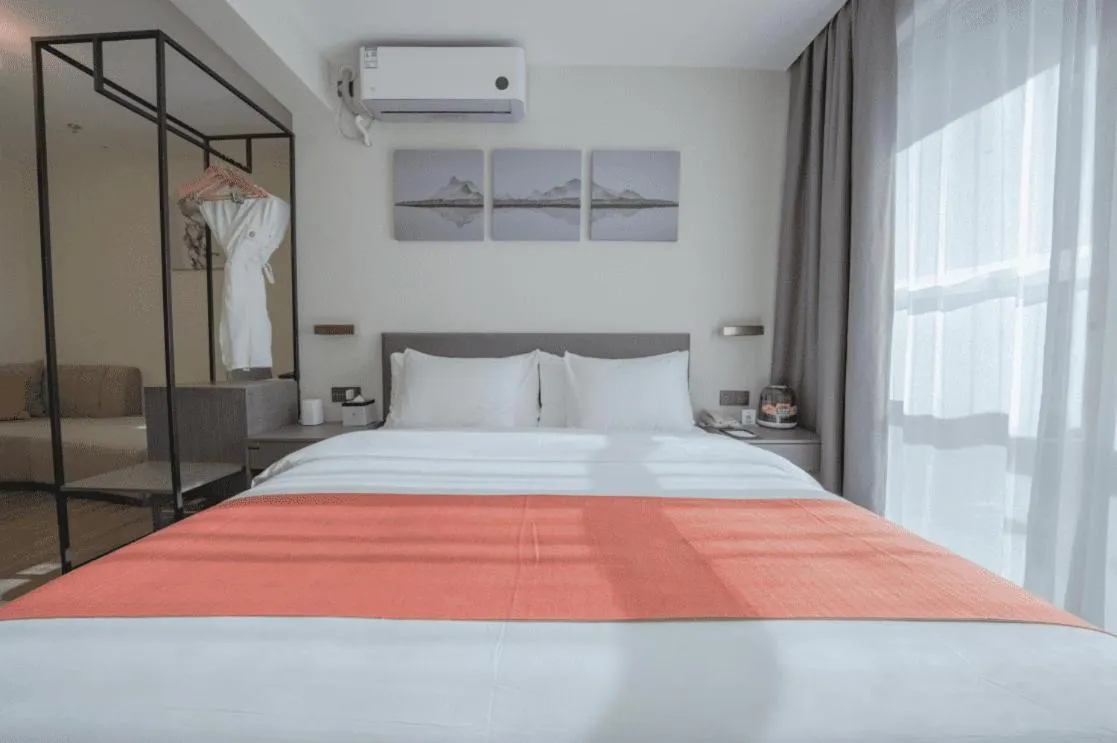 Bed in Shenzhen Kingkey Kingyu Hotel