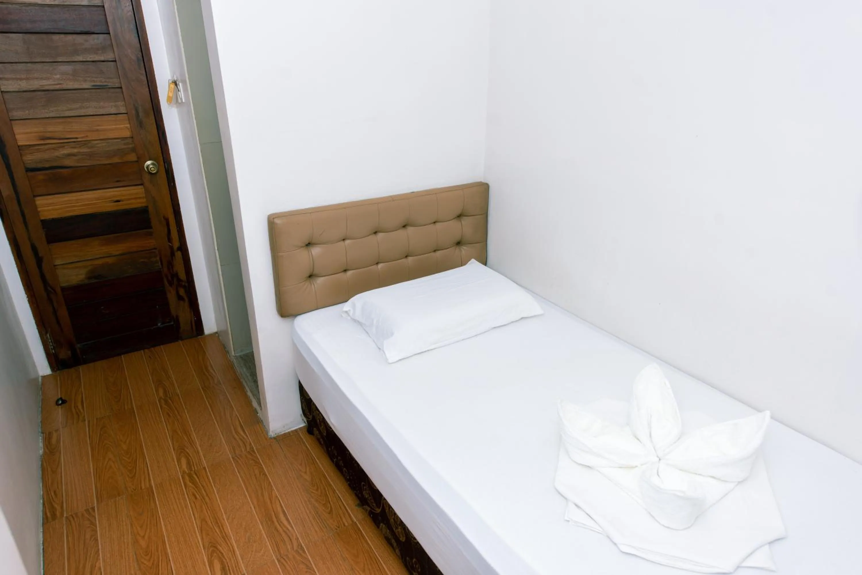 Bed in FB Budgetel Suites