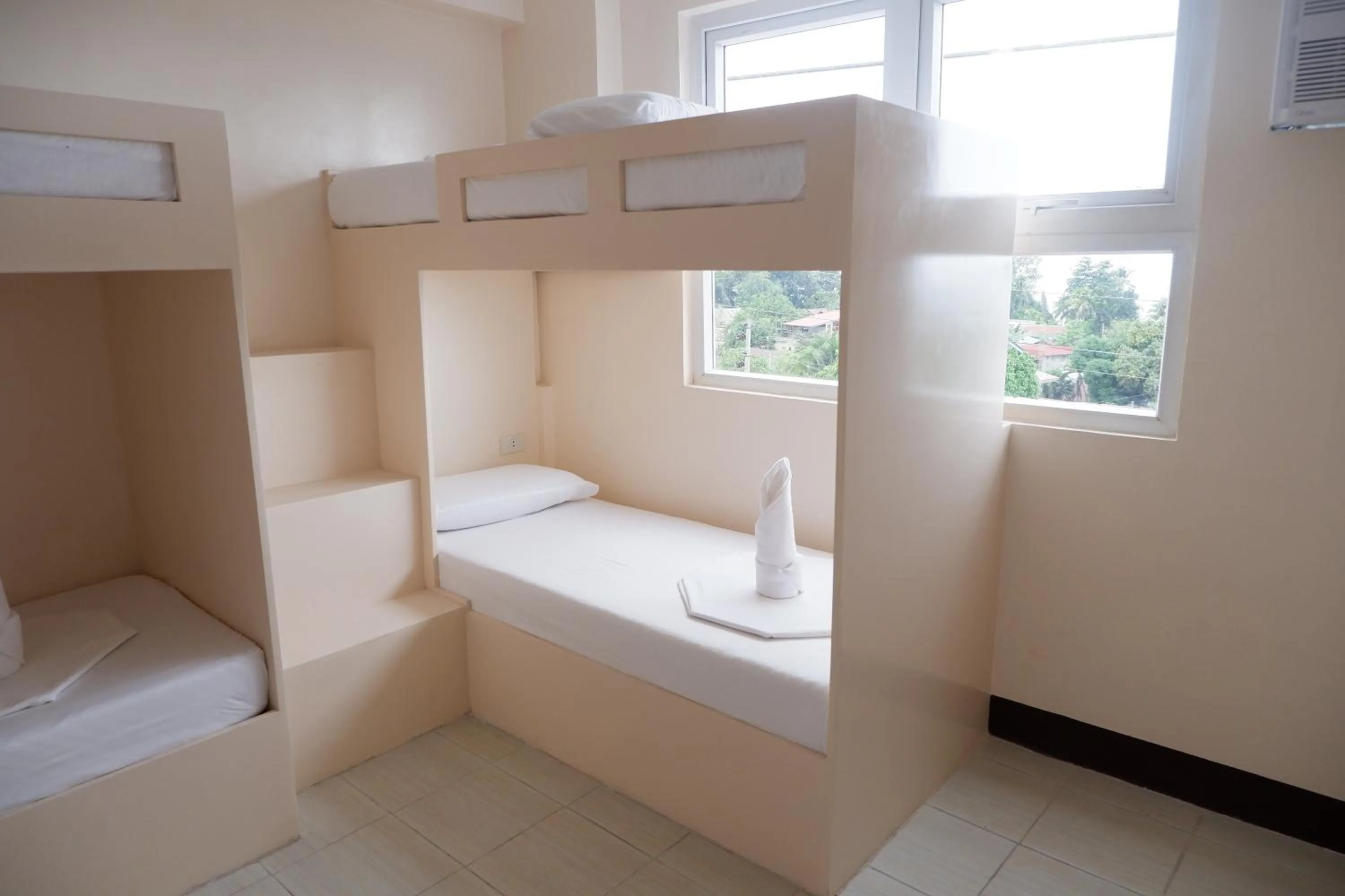 Bed in FB Budgetel Suites