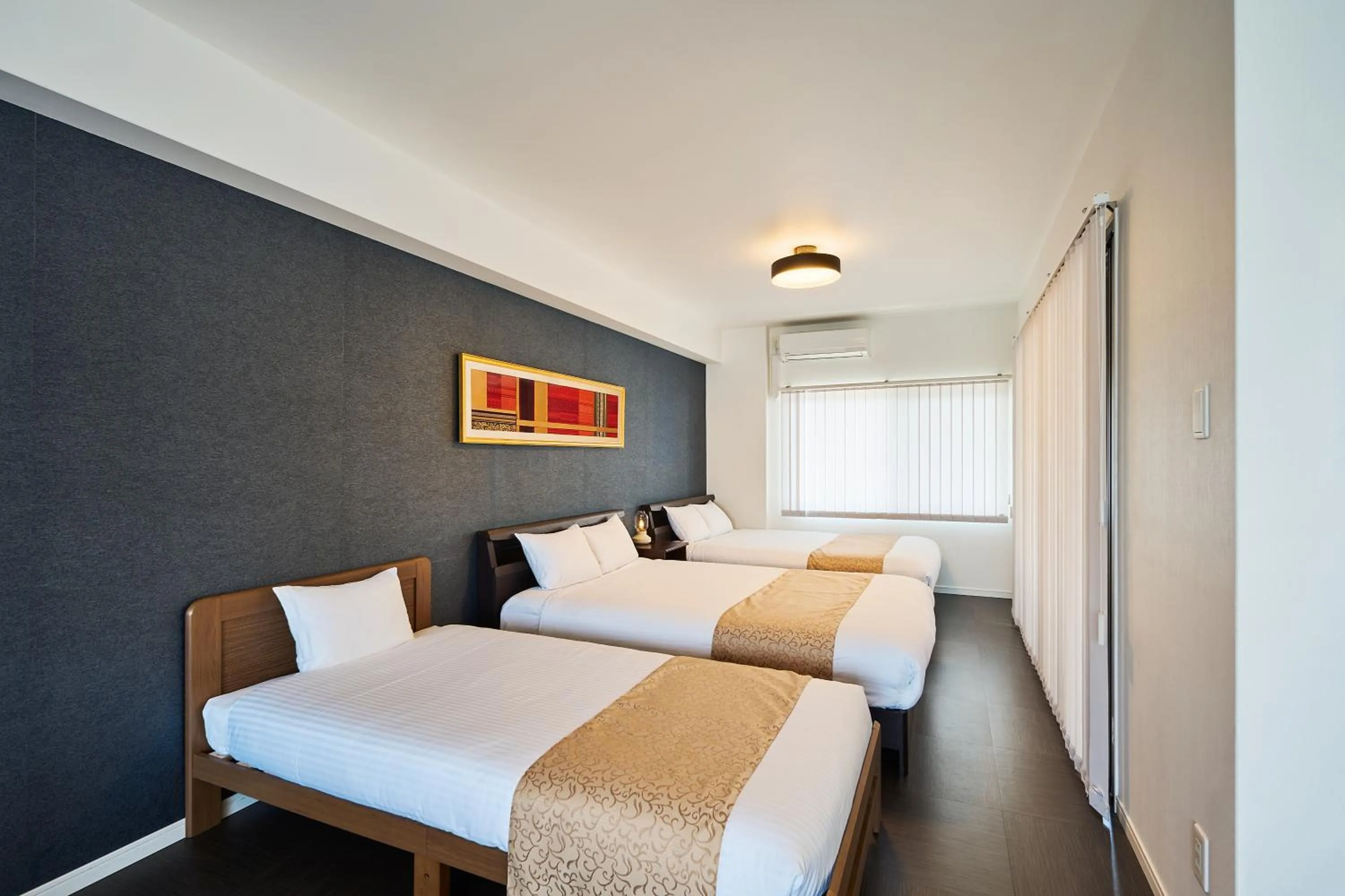 Bed in ALFACIO RIVERSIDE STAY HAKATA