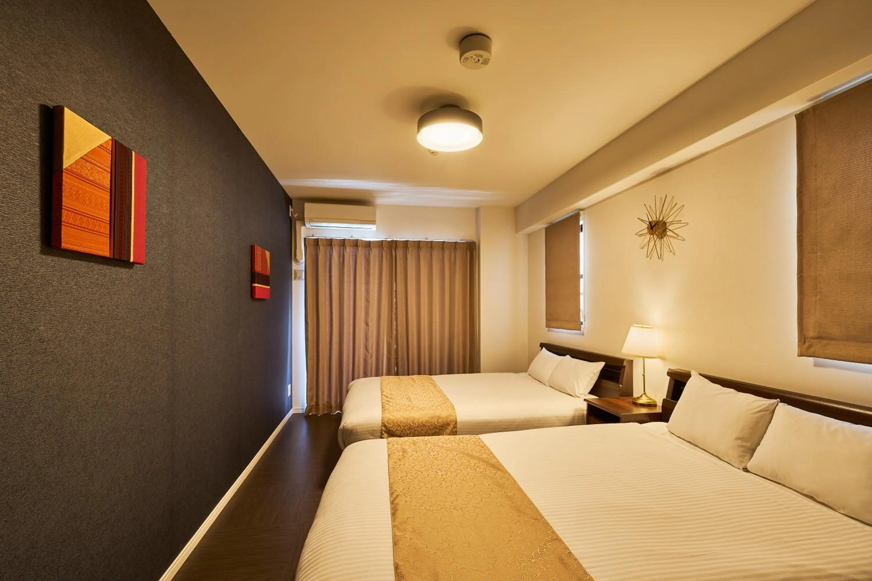 Bed in ALFACIO RIVERSIDE STAY HAKATA