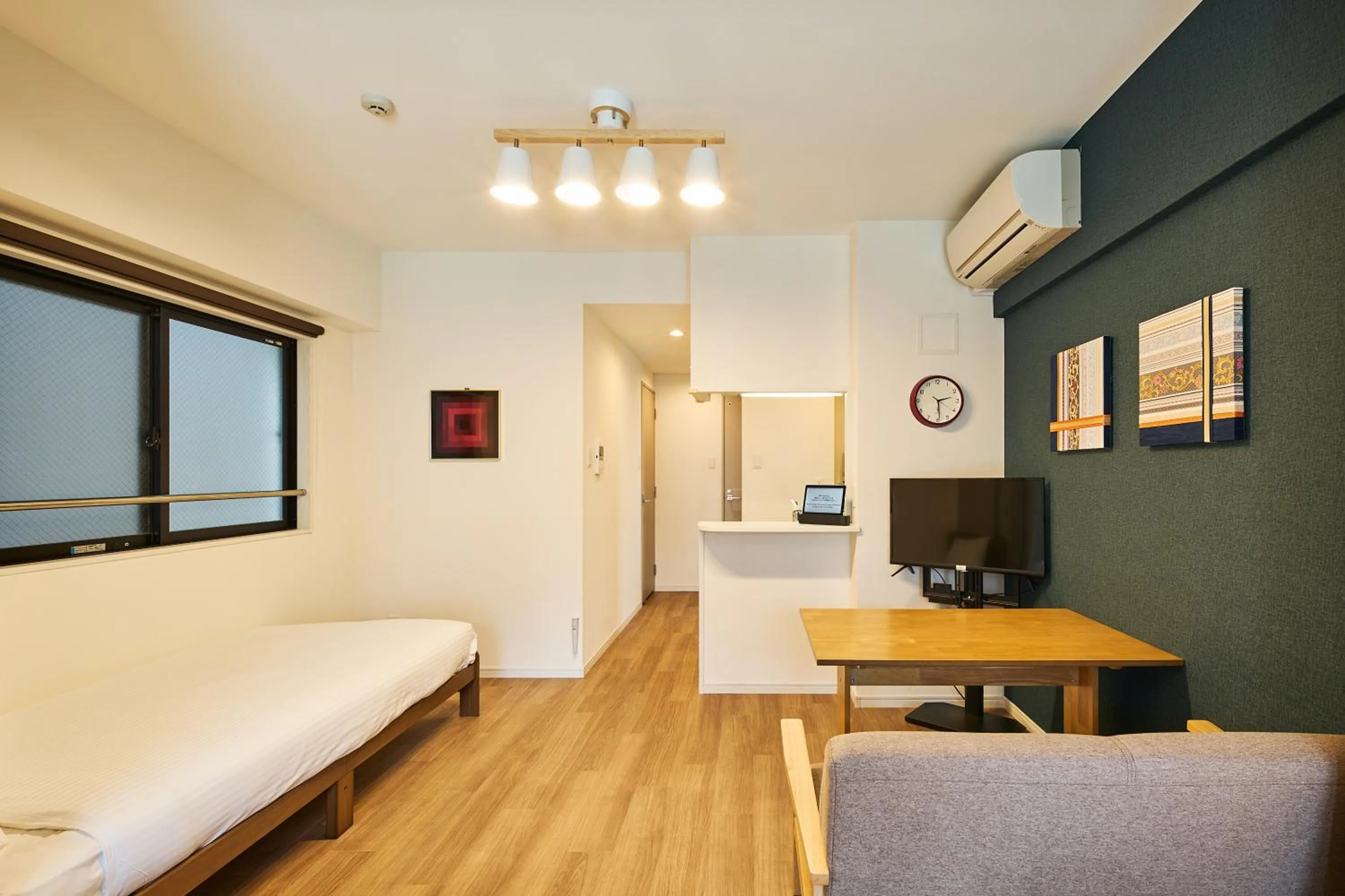 Bed in ALFACIO RIVERSIDE STAY HAKATA