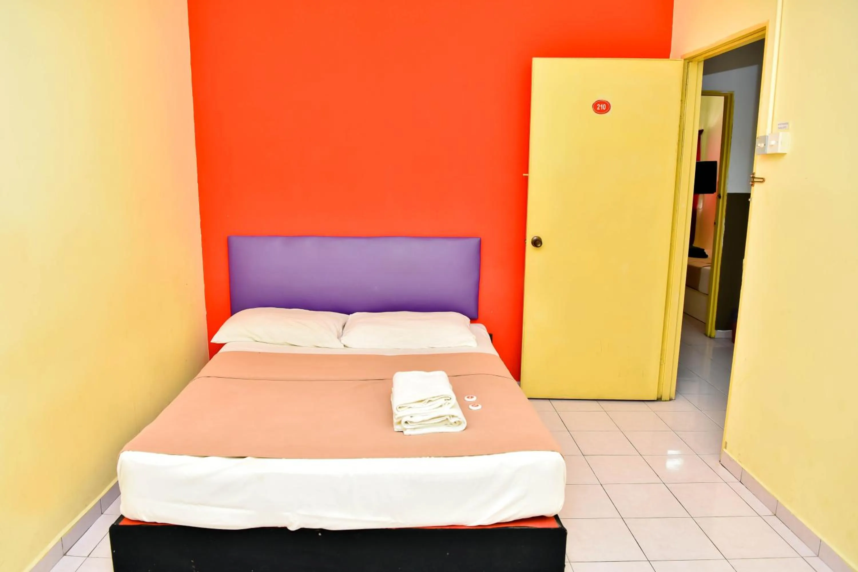 Bed in T FAMILY HOTEL