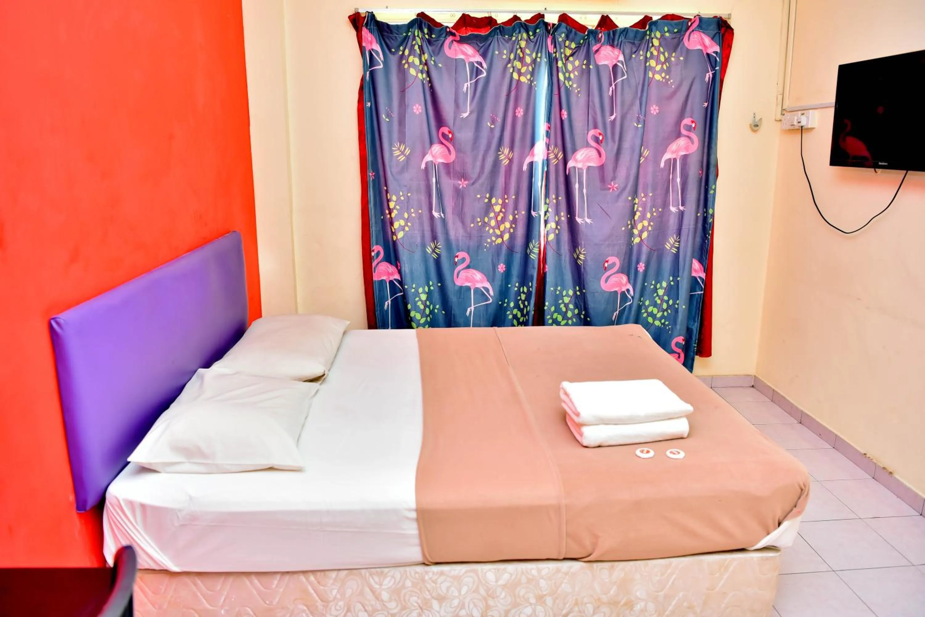 Bed in T FAMILY HOTEL