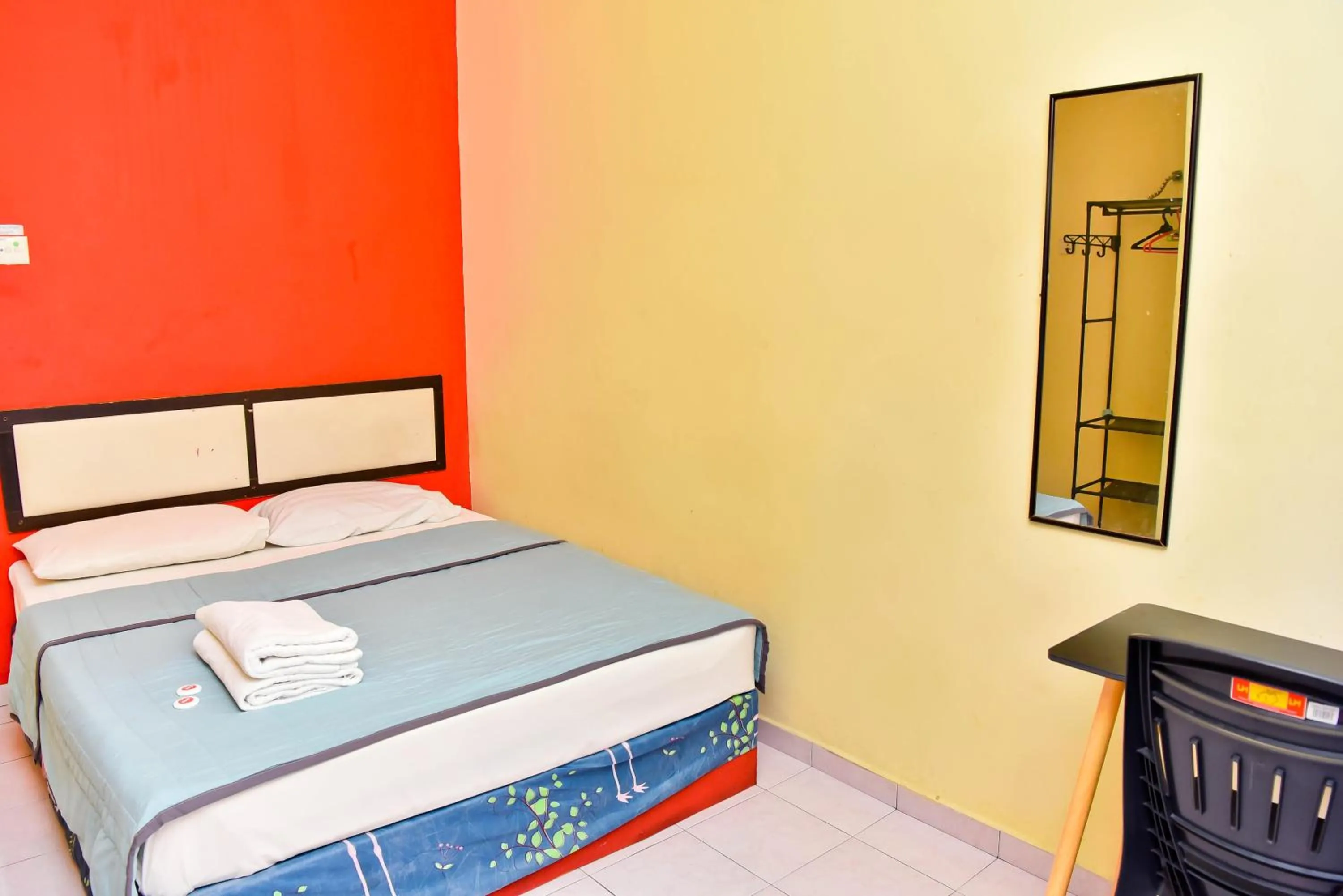 Bed in T FAMILY HOTEL