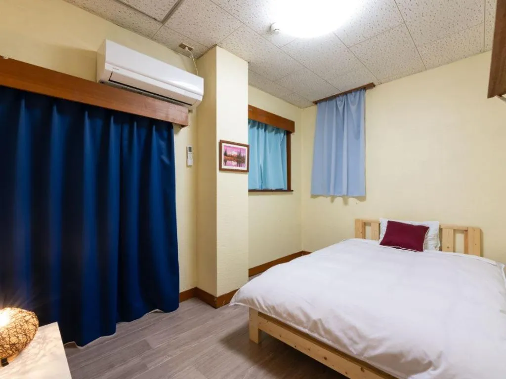 Bed in Travel Inn Kofu