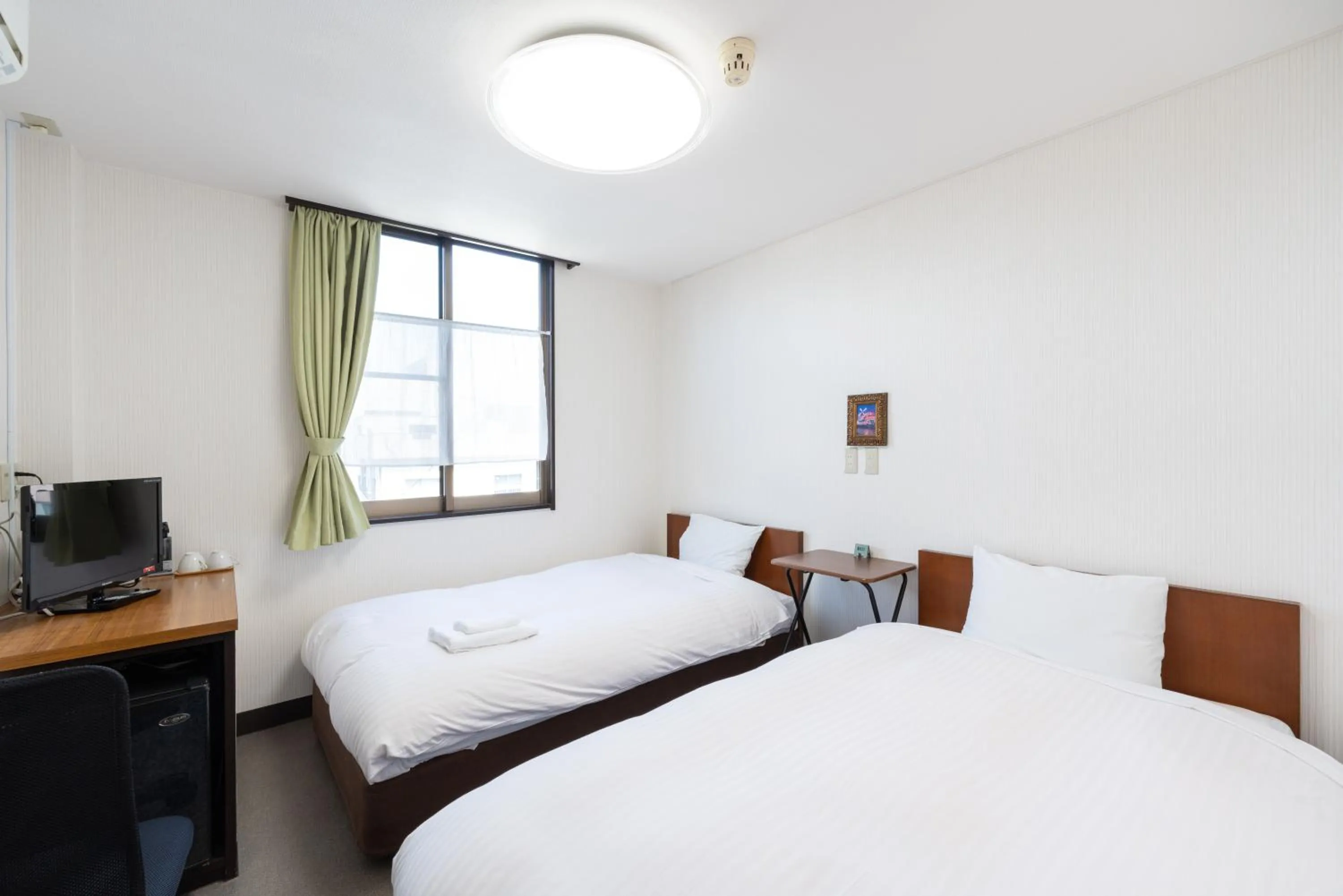 Photo of the whole room, Bed in Travel Inn Kofu