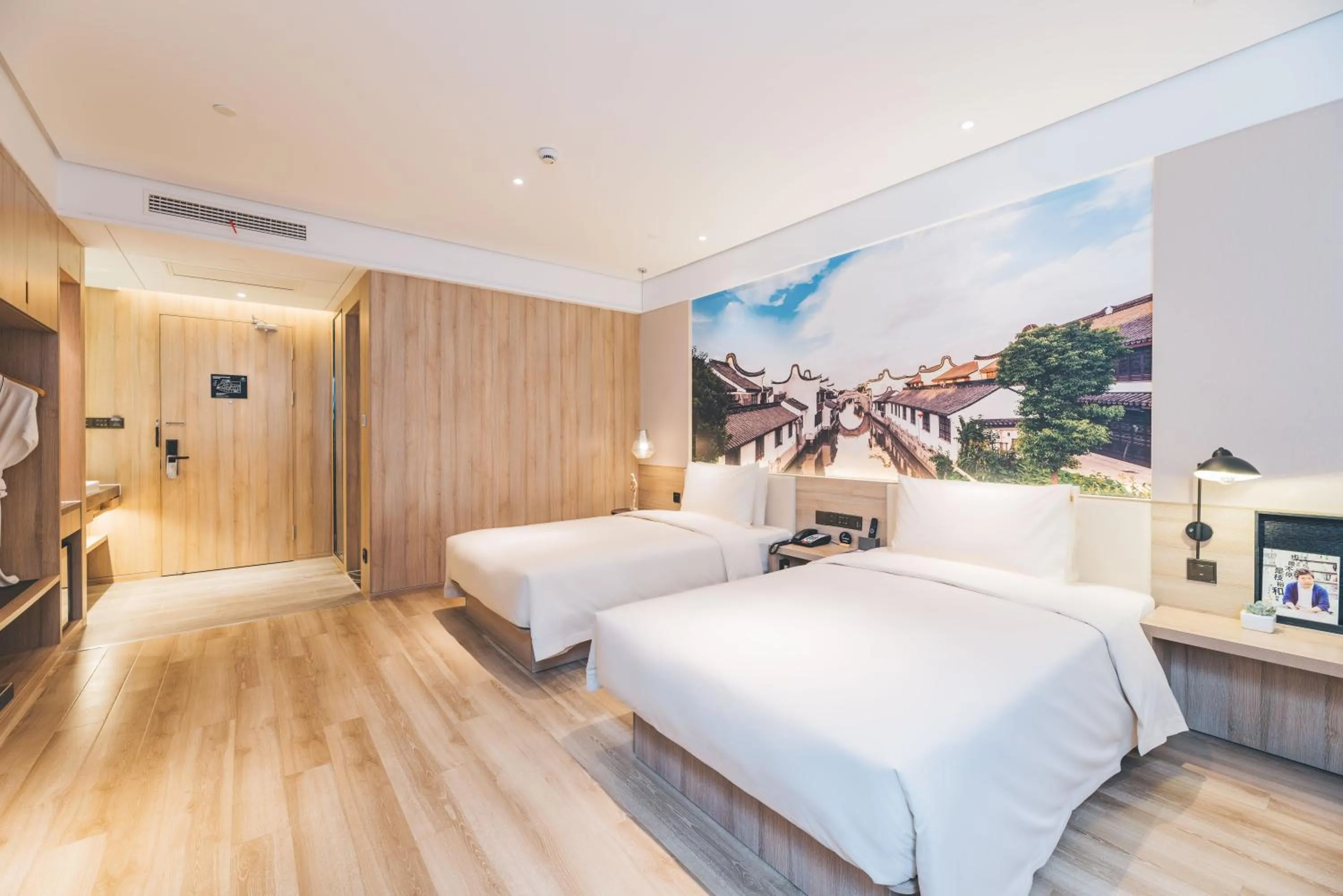 Photo of the whole room, Bed in Atour Hotel Shanghai New International Expo Center Maglev Station