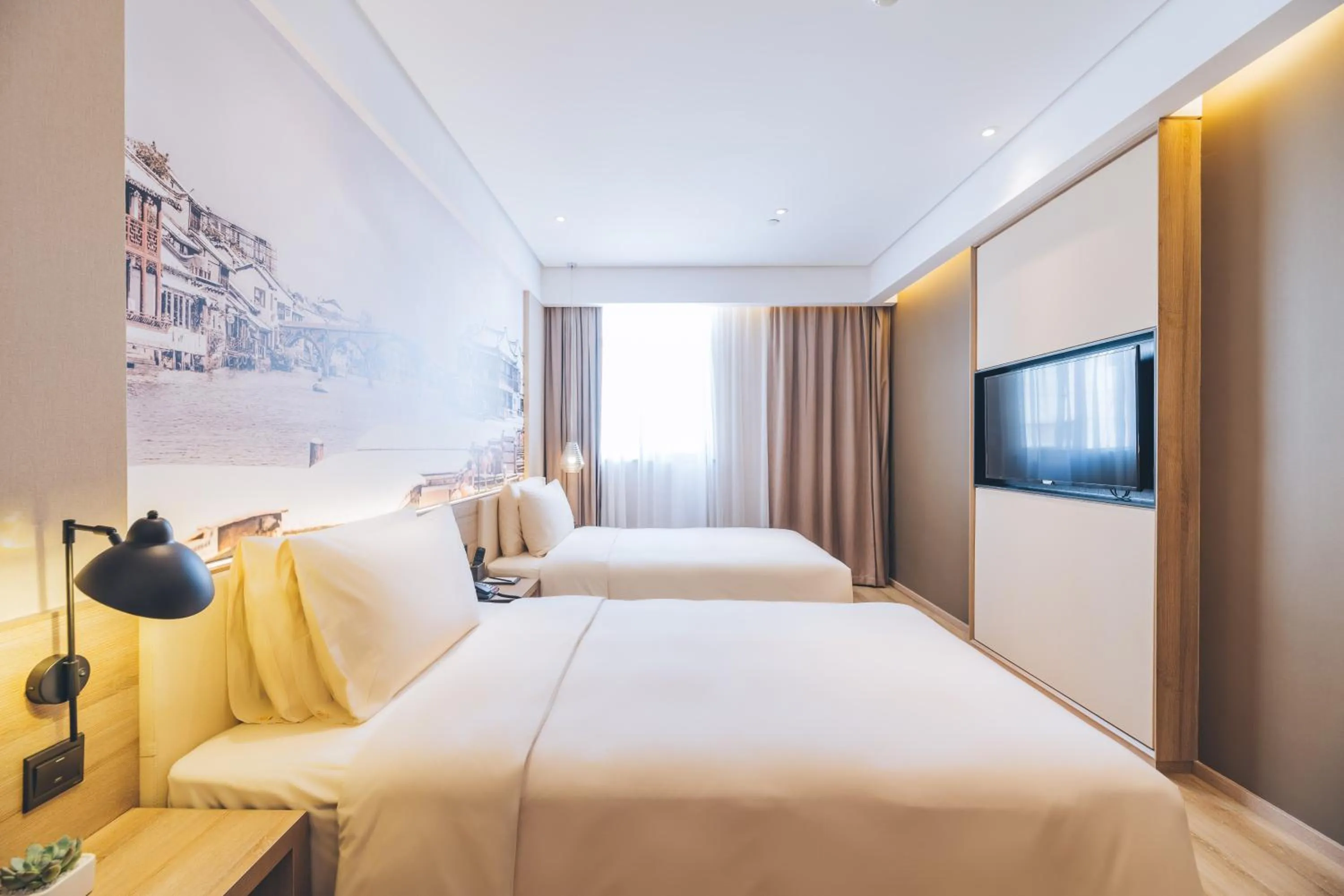 Photo of the whole room, Bed in Atour Hotel Shanghai New International Expo Center Maglev Station