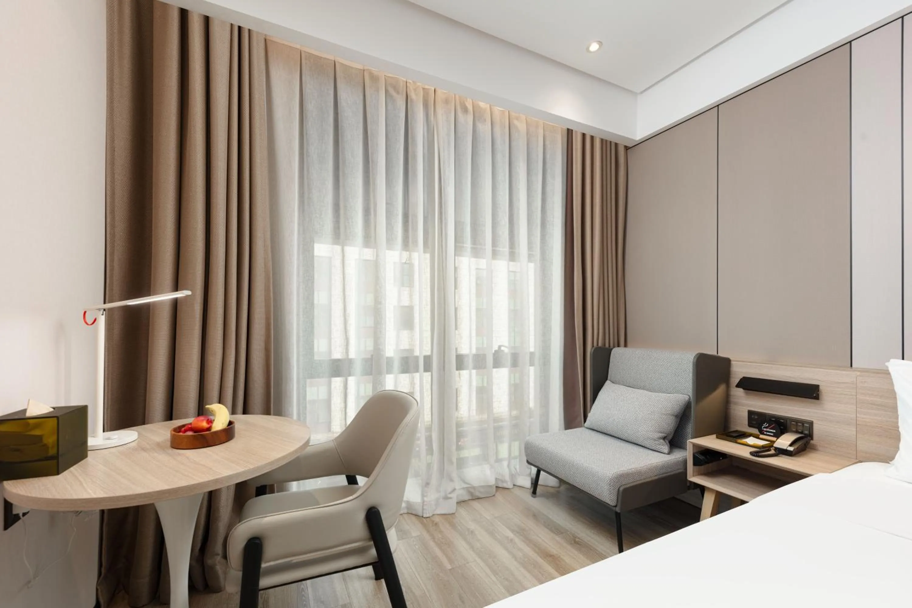 Seating area, Bed in Atour Hotel Shanghai Hongqiao Korea Street