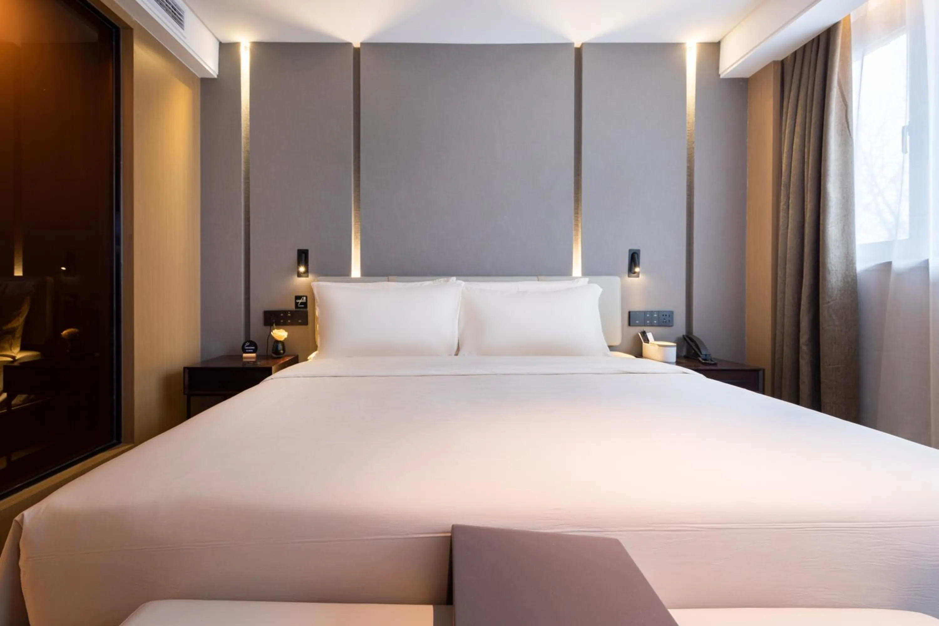 Bed in Atour Hotel Suzhou Guanqian Street Leqiao Station