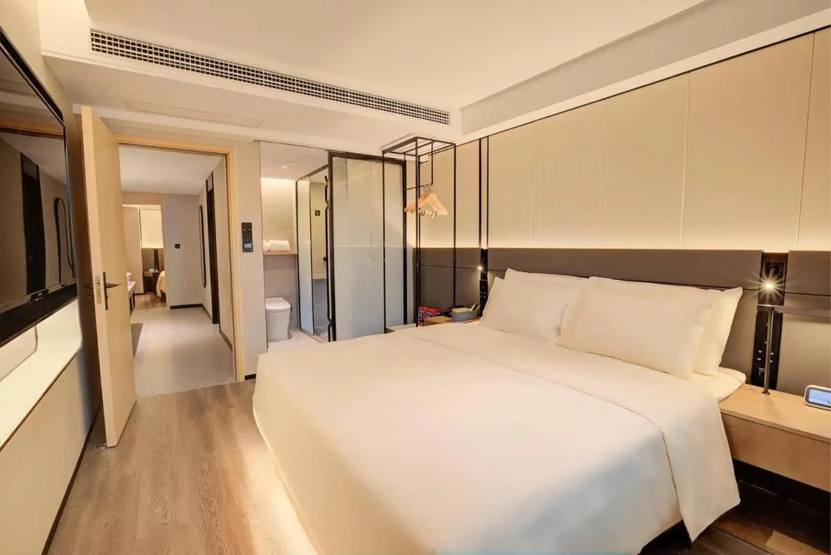 Bed in Atour S Hotel Chongqing Jiefangbei Hongyadong Riverview