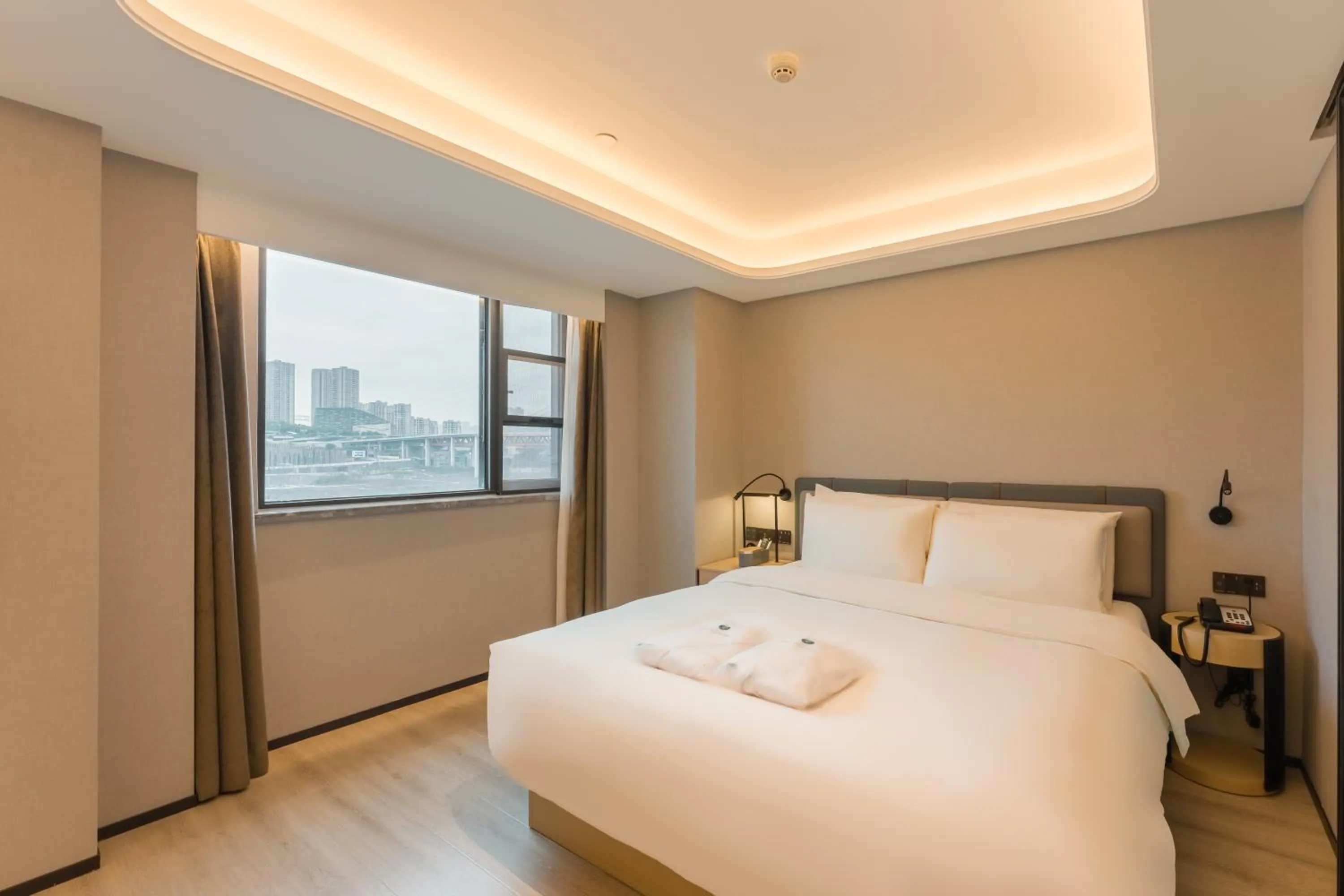Bed in Atour S Hotel Chongqing Jiefangbei Hongyadong Riverview