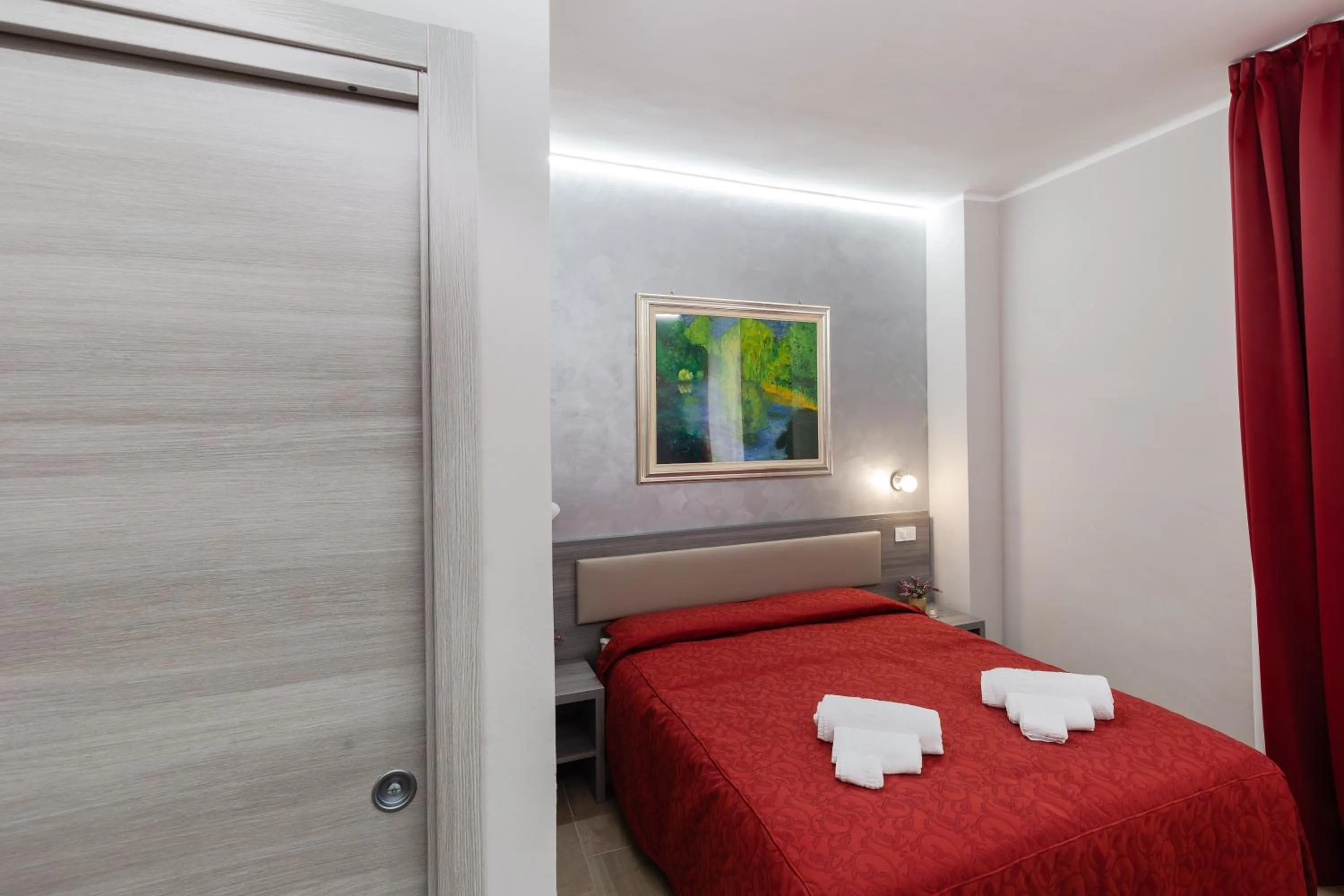 Bed in Affittacamere Alessia