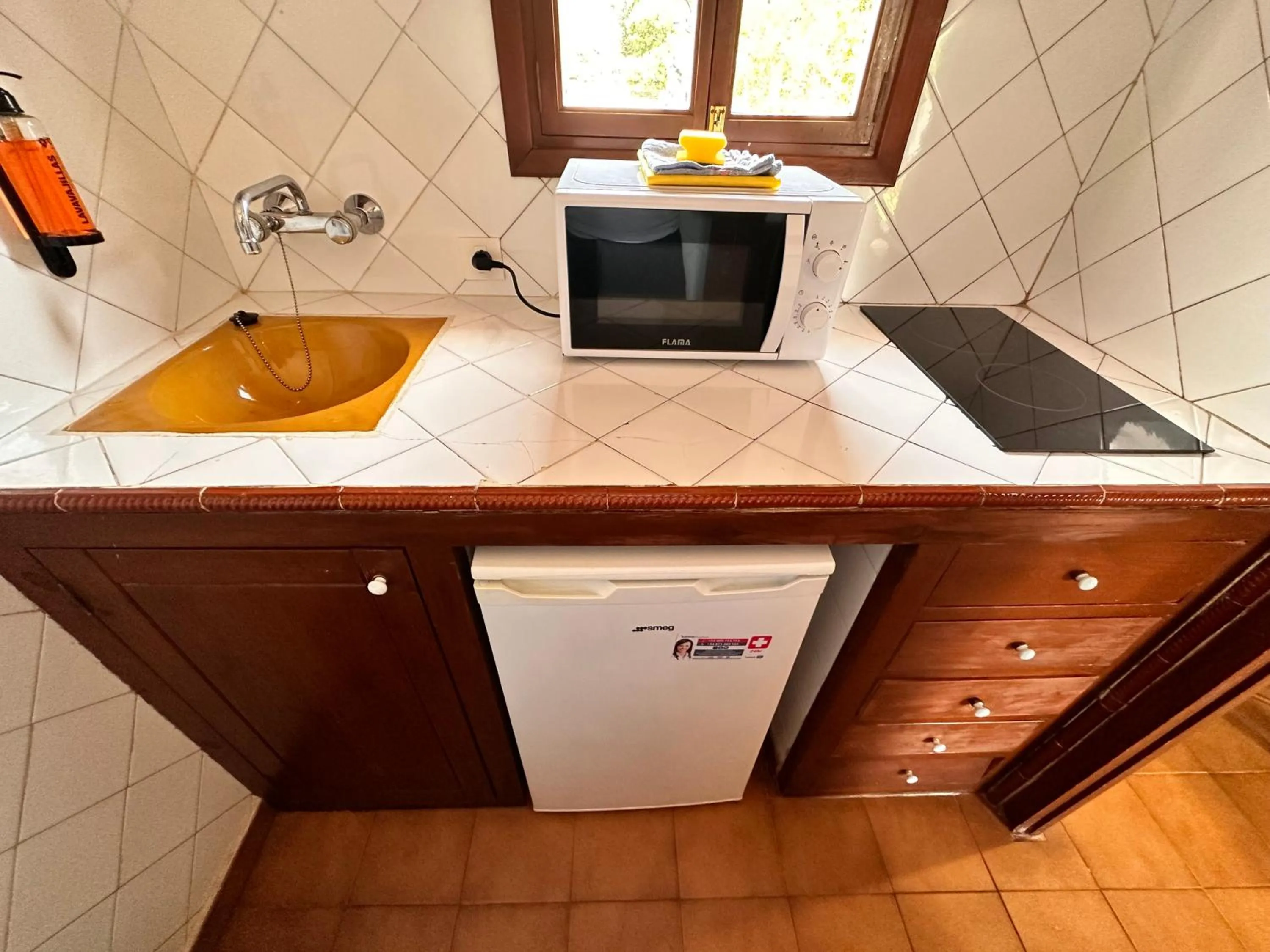 Kitchen or kitchenette in Binivell Park - 30º apartments